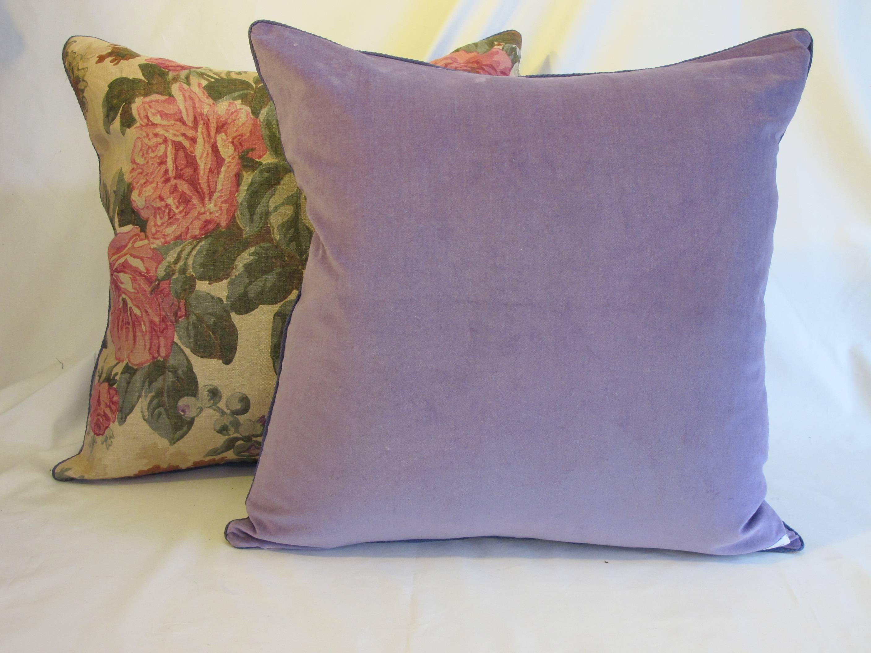A pair of lovely pillows made from a circa 1920s floral printed linen in glorious spring colors, backed with a coordinating cotton velvet, with a hidden zipper closure, down inserts are included.