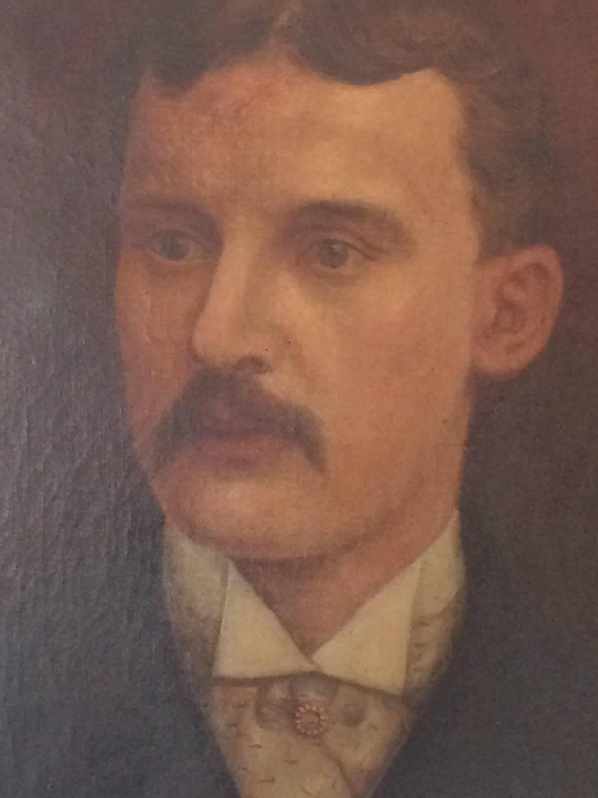 Striking antique oil painting portrait of a handsome gentleman with reddish hair and masculine mustache in somber muted tones. No signature. Muted gold frame and cream linen matte.