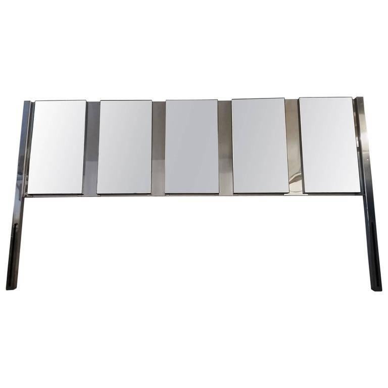 A king-sized headboard by O. B. Solie for Ello having mirrored front and chrome recessed trim. T.
