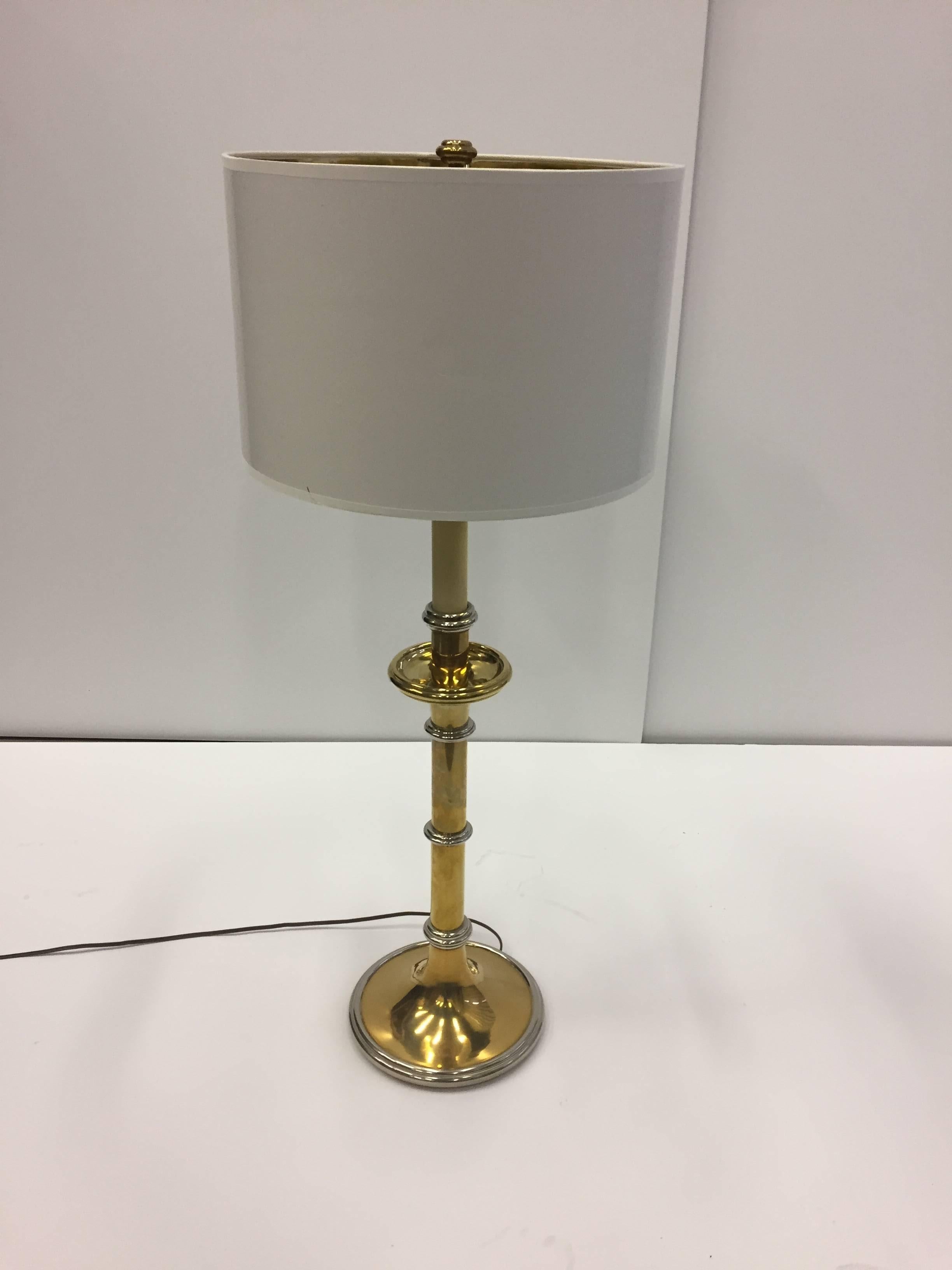 Elegant and high quality glamorous table lamps having brass candlestick style shape with chrome details, custom shades with gold metal lining, 60 watt each.
31.5 to top of socket.