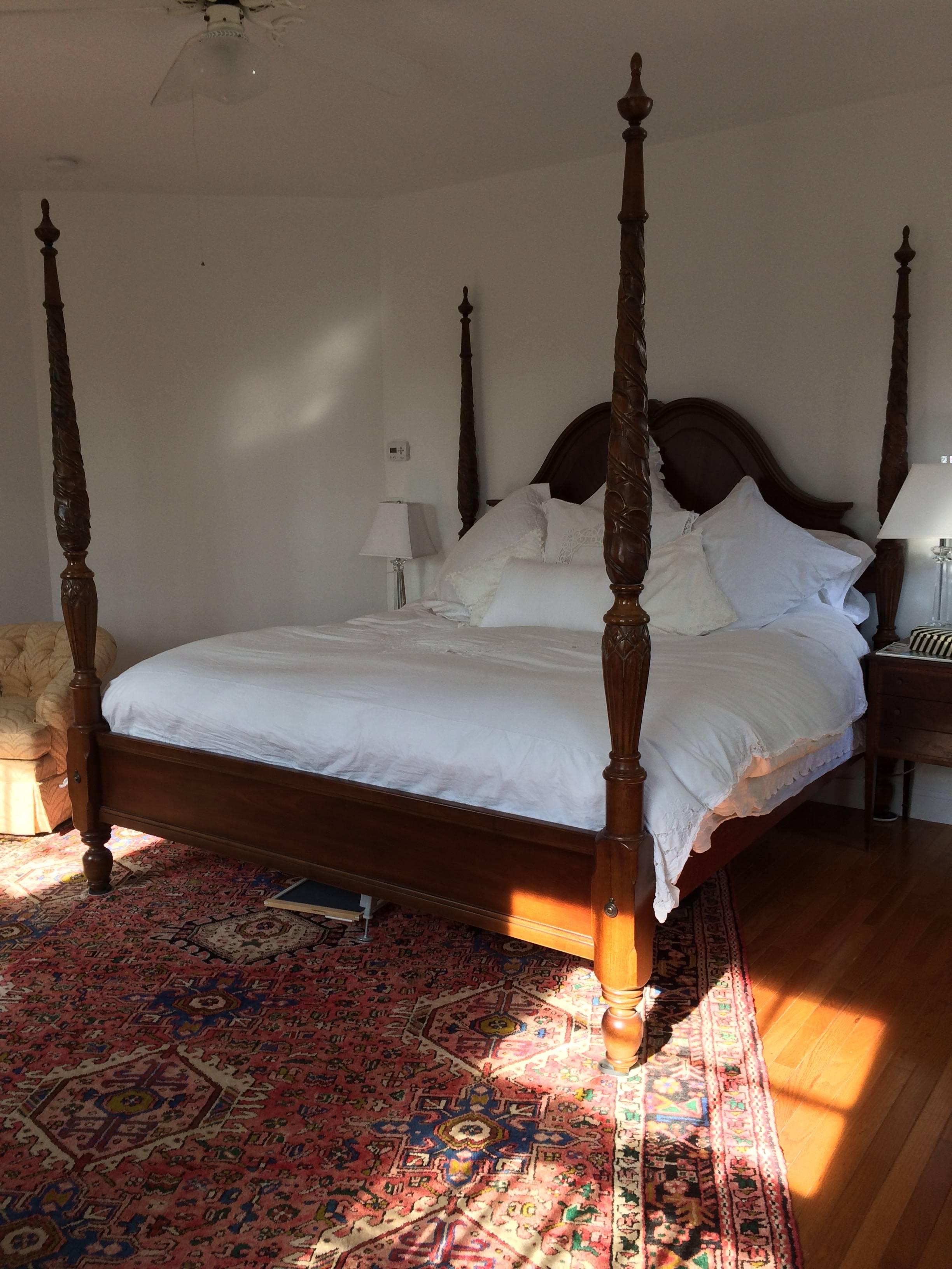 Fit for a king and queen, a very elegant carved wood four poster California King bed frame, having a curved headboard with gorgeous sunburst grain.
Measures: Headboard is 66.75 H, side rails 19.25 H.