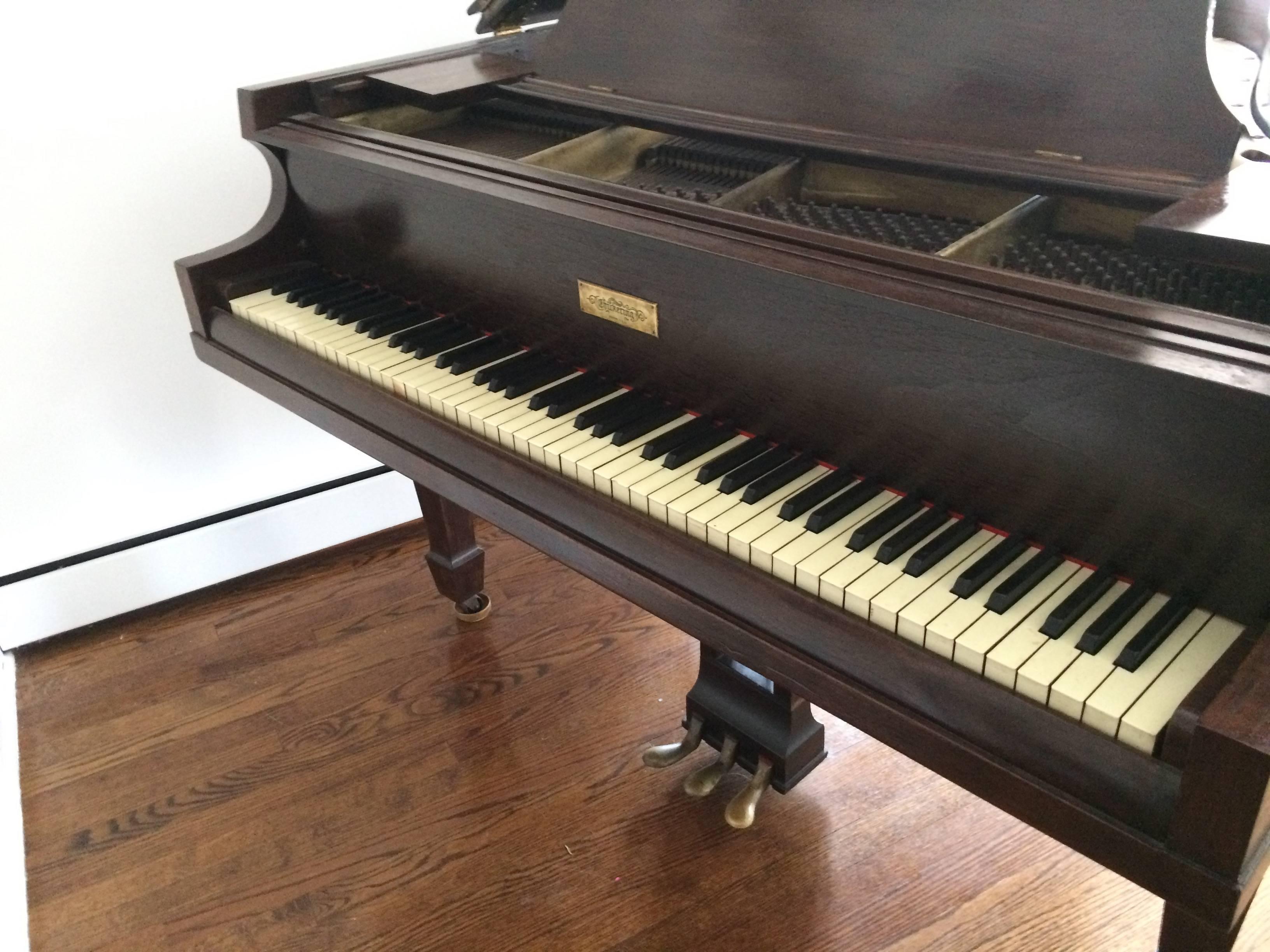 antique baby grand piano