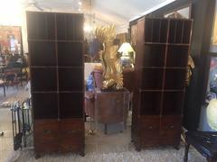 Pair of Theodore Alexander Campaign Style Leather Wrapped Bookshelves