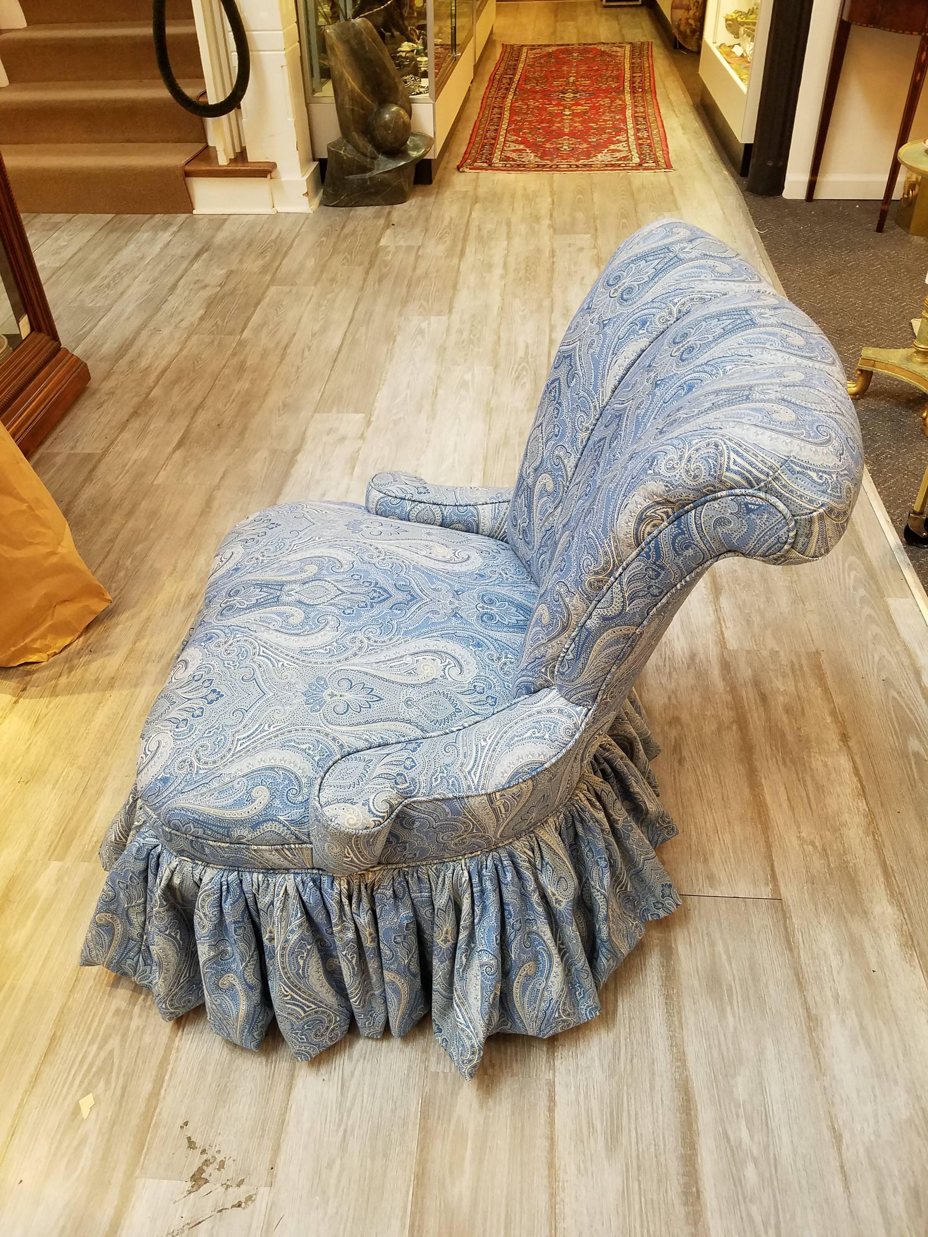 Vintage 1940s channel back slipper chair newly upholstered in Ralph Lauren printed linen blue and white paisley.
Measures: Seat height 15.