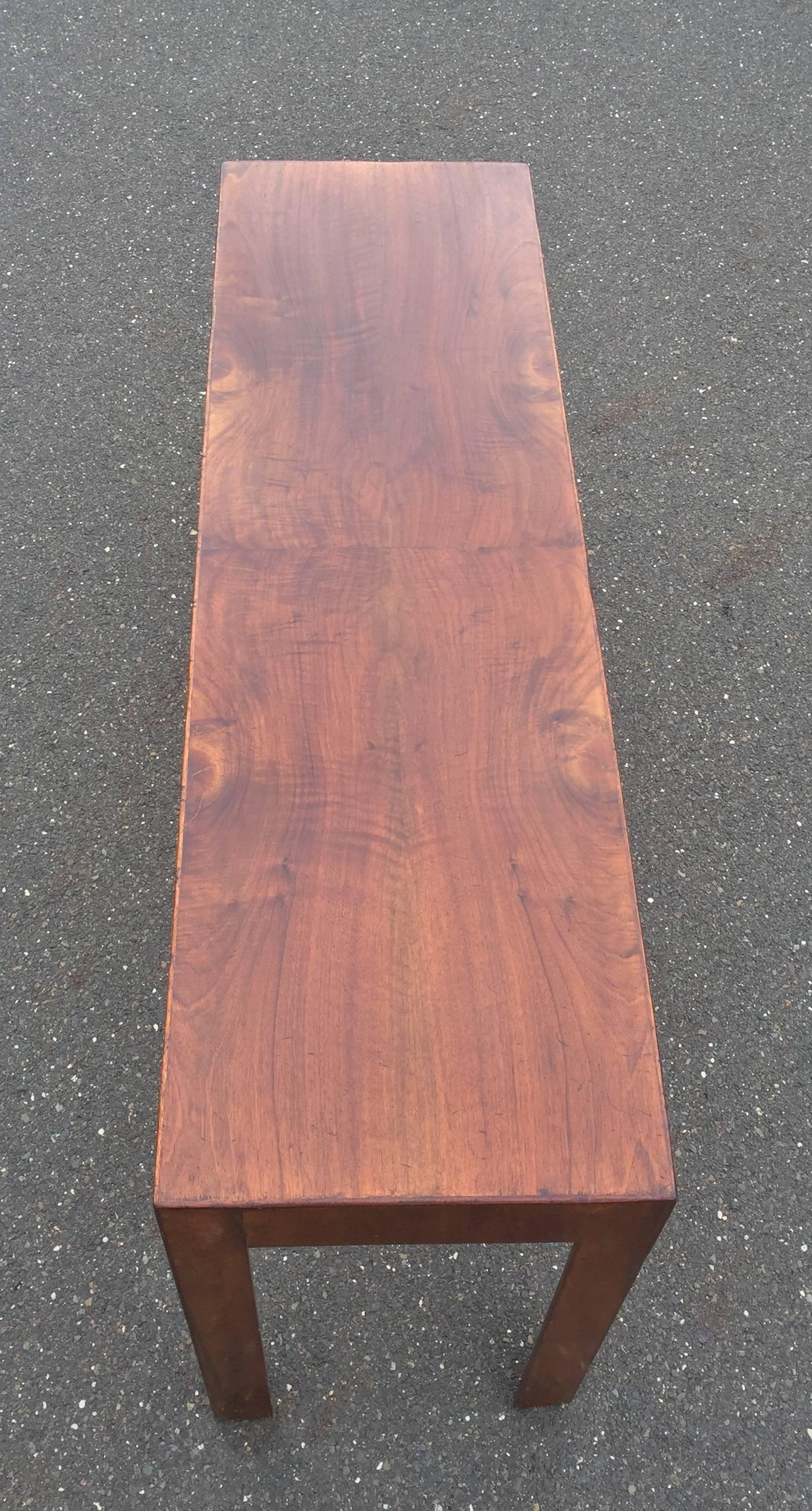 Clean lines, Mid-Century Modern silouette, bookmatched walnut top, has been intentionally distressed.

Made in Italy 
Skirt thickness 4 inches
Opening measures: H 24 inches x W 48 1/4.