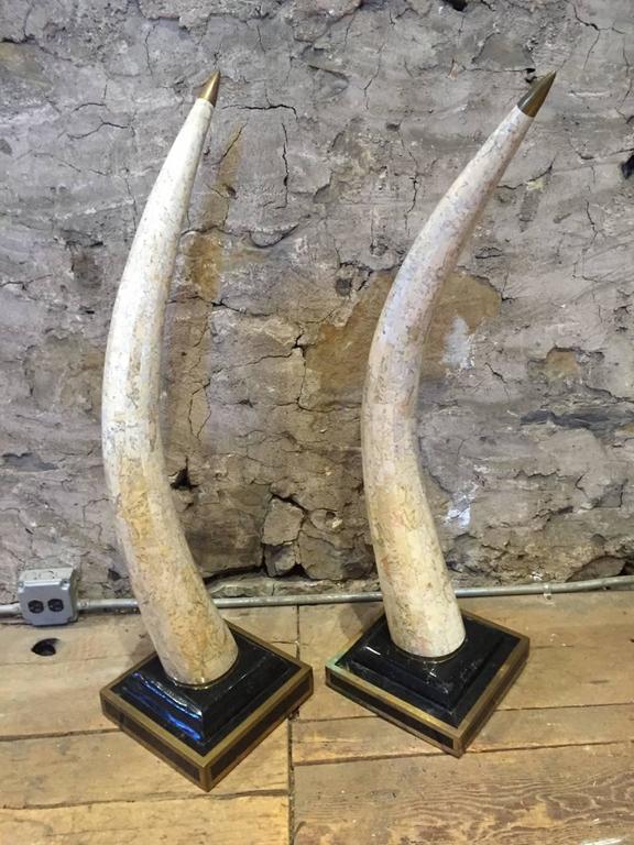 Sensational Pair of Travertine Faux Elephant Tusk Sculptures at 1stDibs