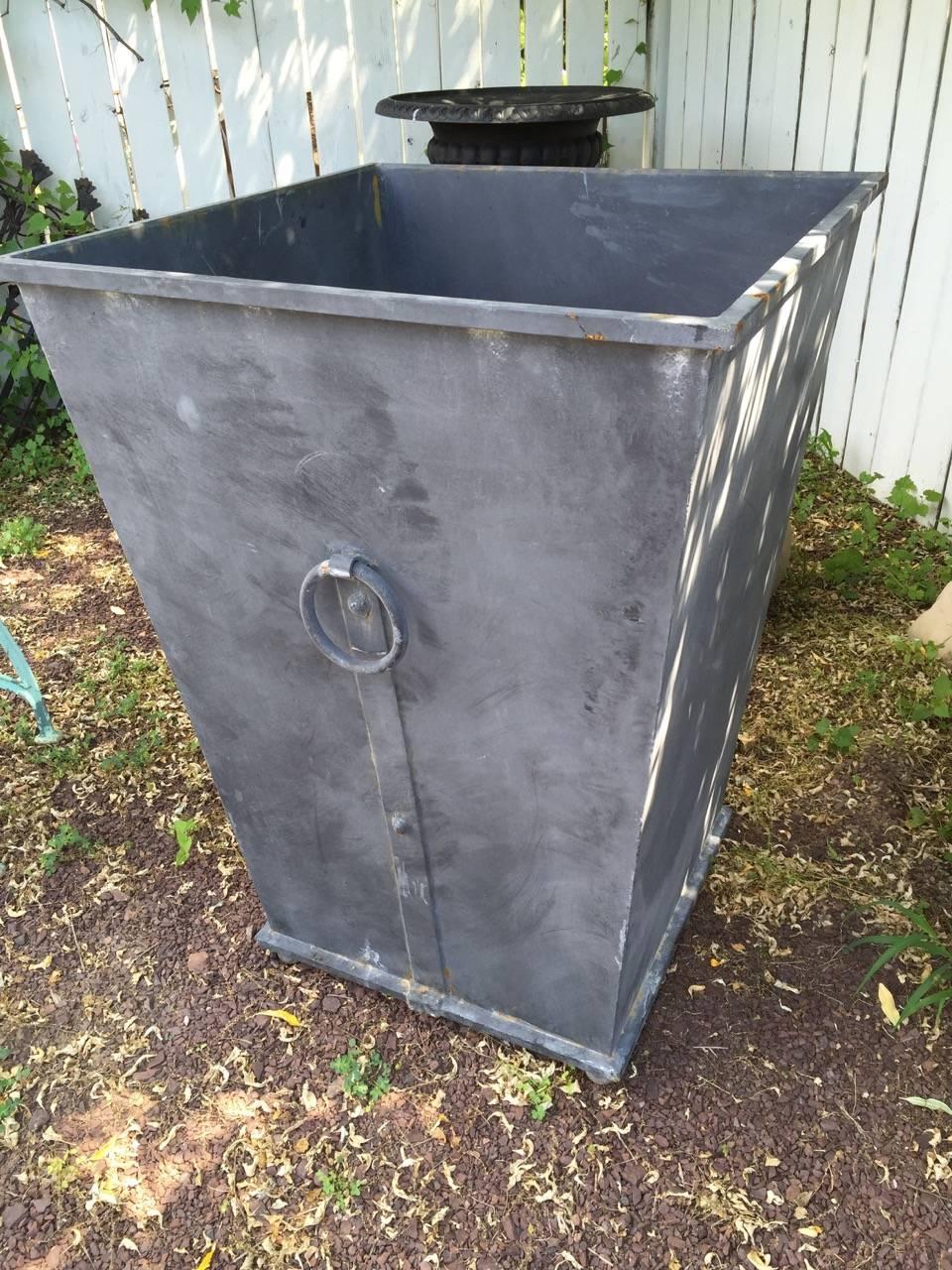 Pair of square steel planters with lead colored finish and handsome ring details.