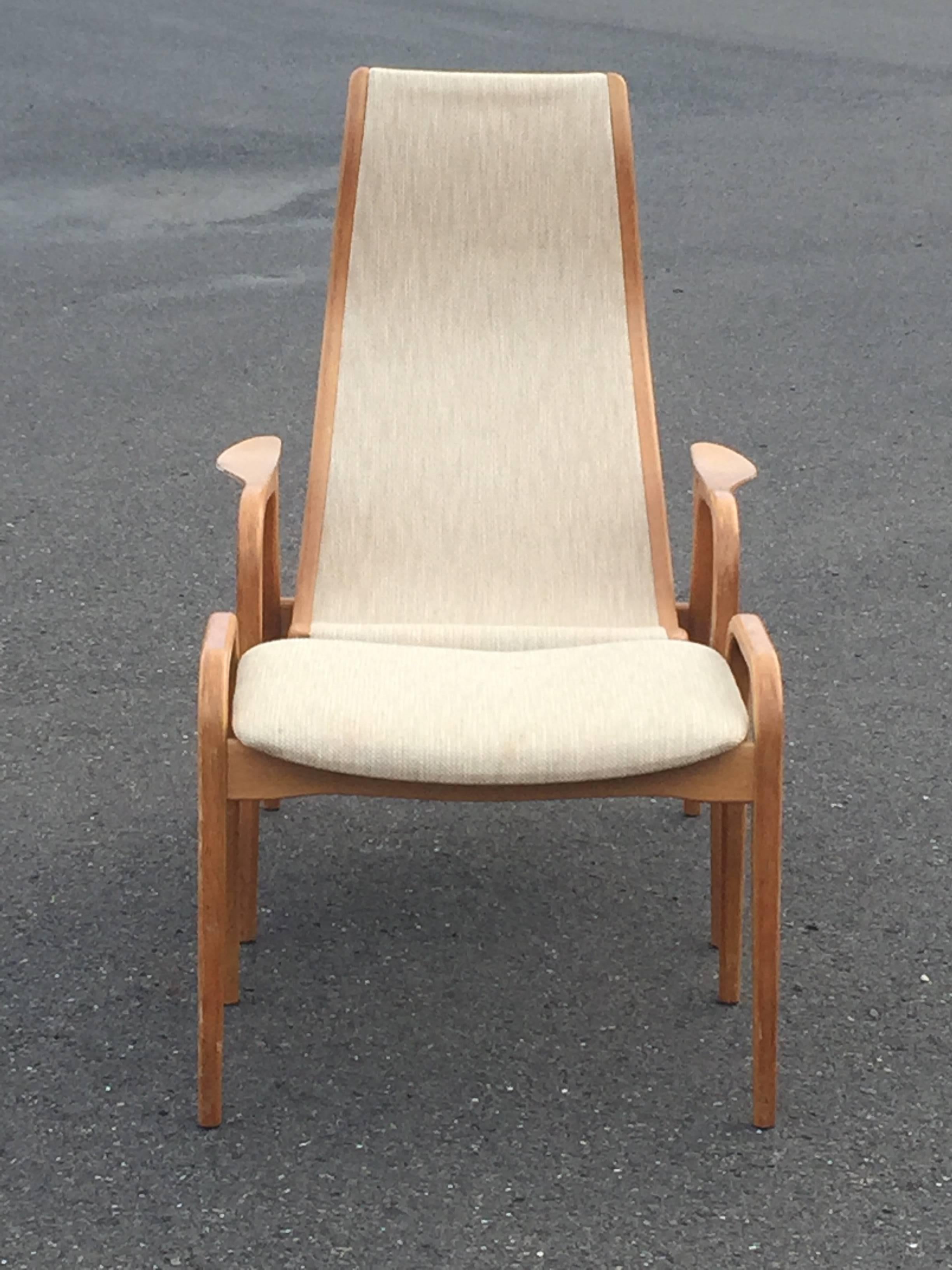 Lamino lounge chair and ottoman designed by Yngve Ekstrom, Sweden, circa 1950s. Lovely white oak frames with neutral cream tweedy upholstery. 
Ottoman 23 3/8 W, 17 D, 16 H.