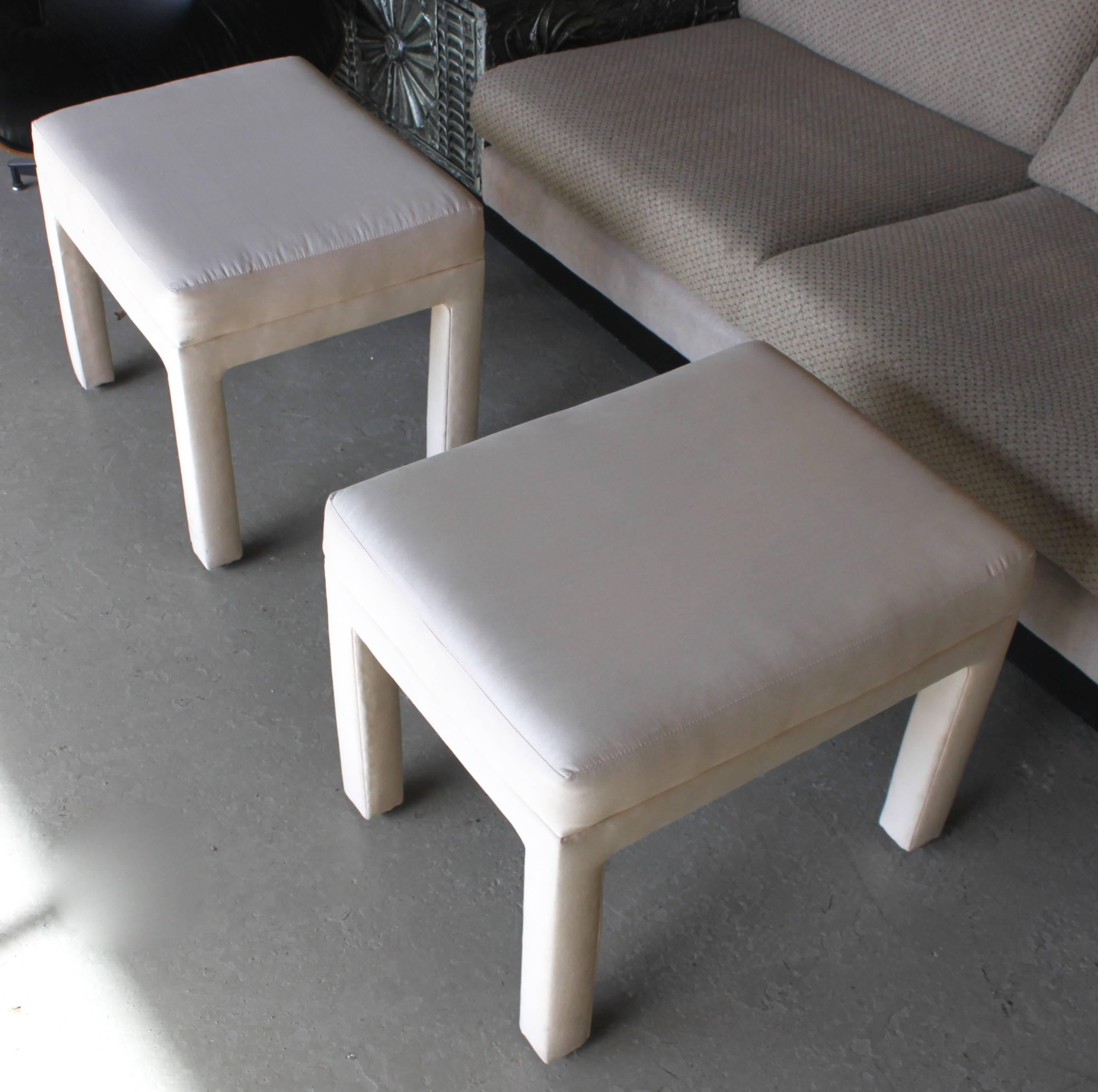 Pair of upholstered stools. We do not guarantee condition of fabric. Condition as shown in pictures.