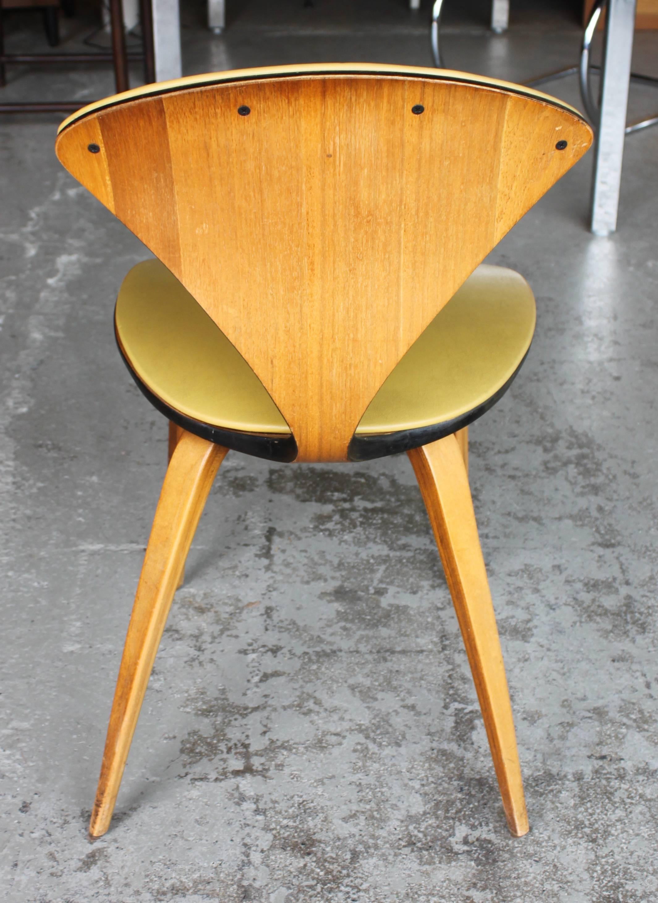 In mint condition Norman Cherner side chair by Plycraft. Labeled.