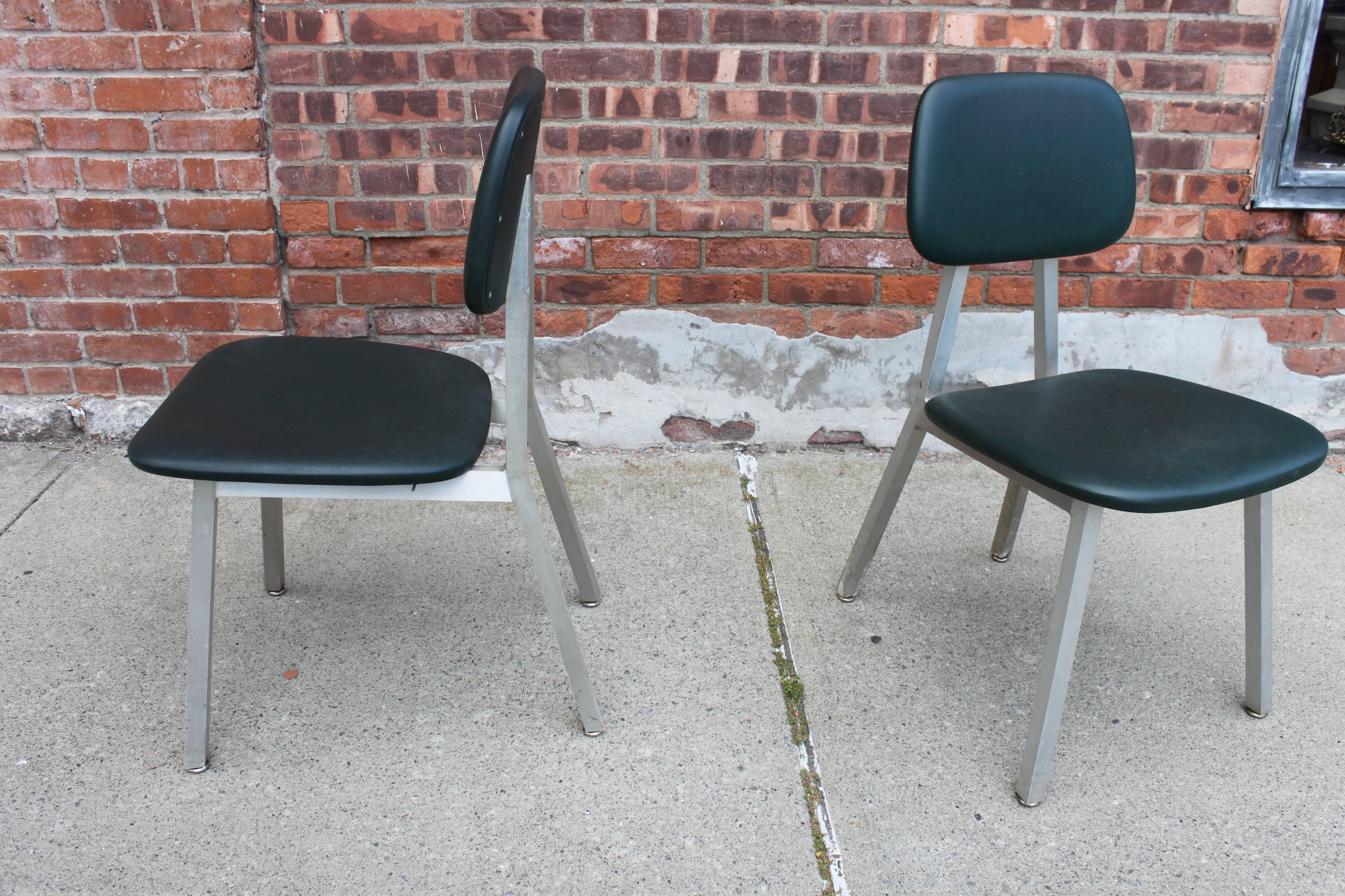 Great Mid-Century Industrial chairs by Shaw Walker. Dated 1961. In original condition. Aluminium base. One small tear under seat which is not noticeable.