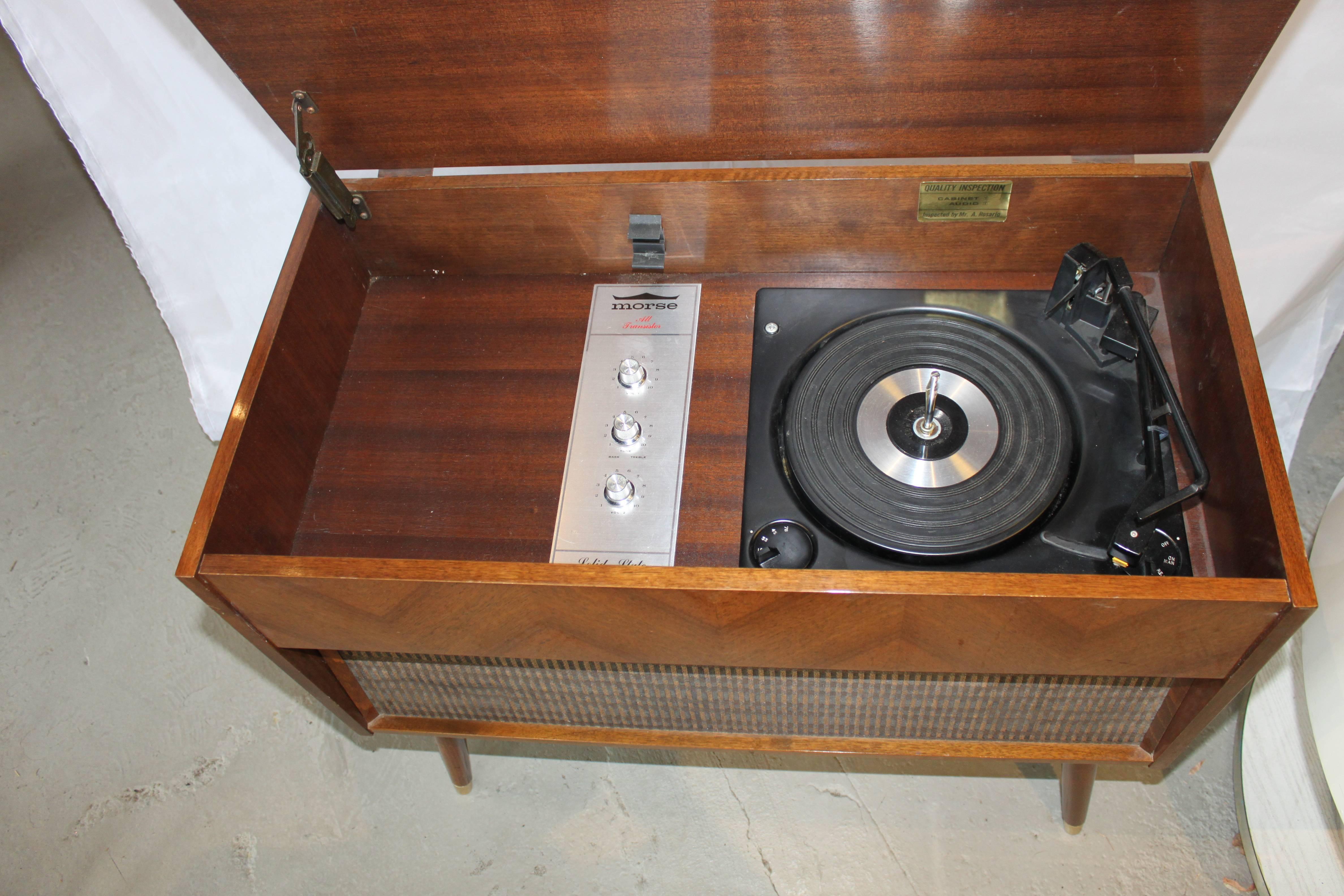 Awesome vintage records player. Mechanically it has been upgraded. We do not have warranty on the mechanical.