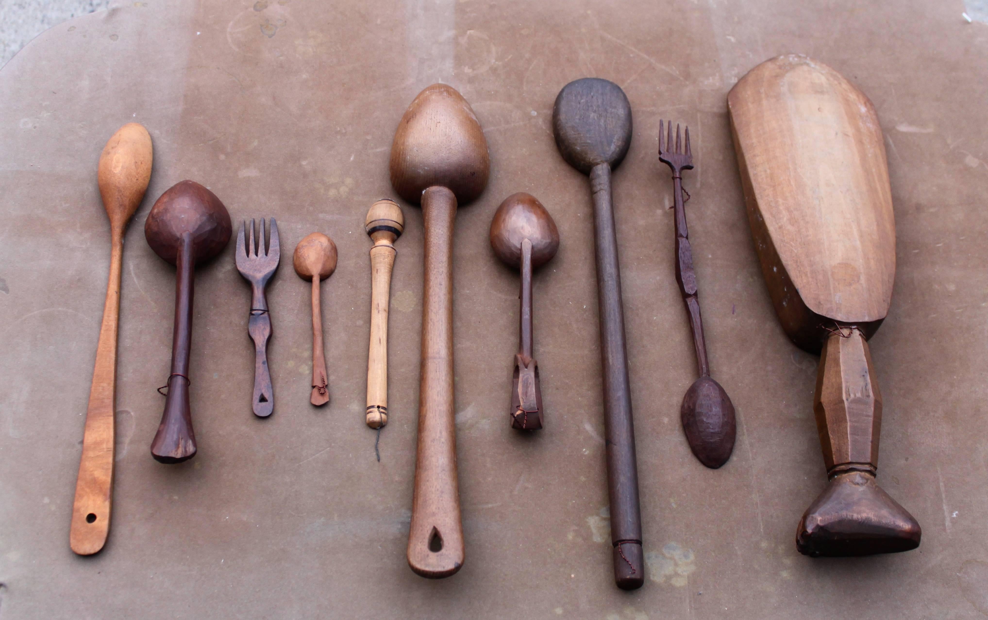 Cabinet of curiosities:
Diverse spoons, forks, and an early spork.
All hand-carved.