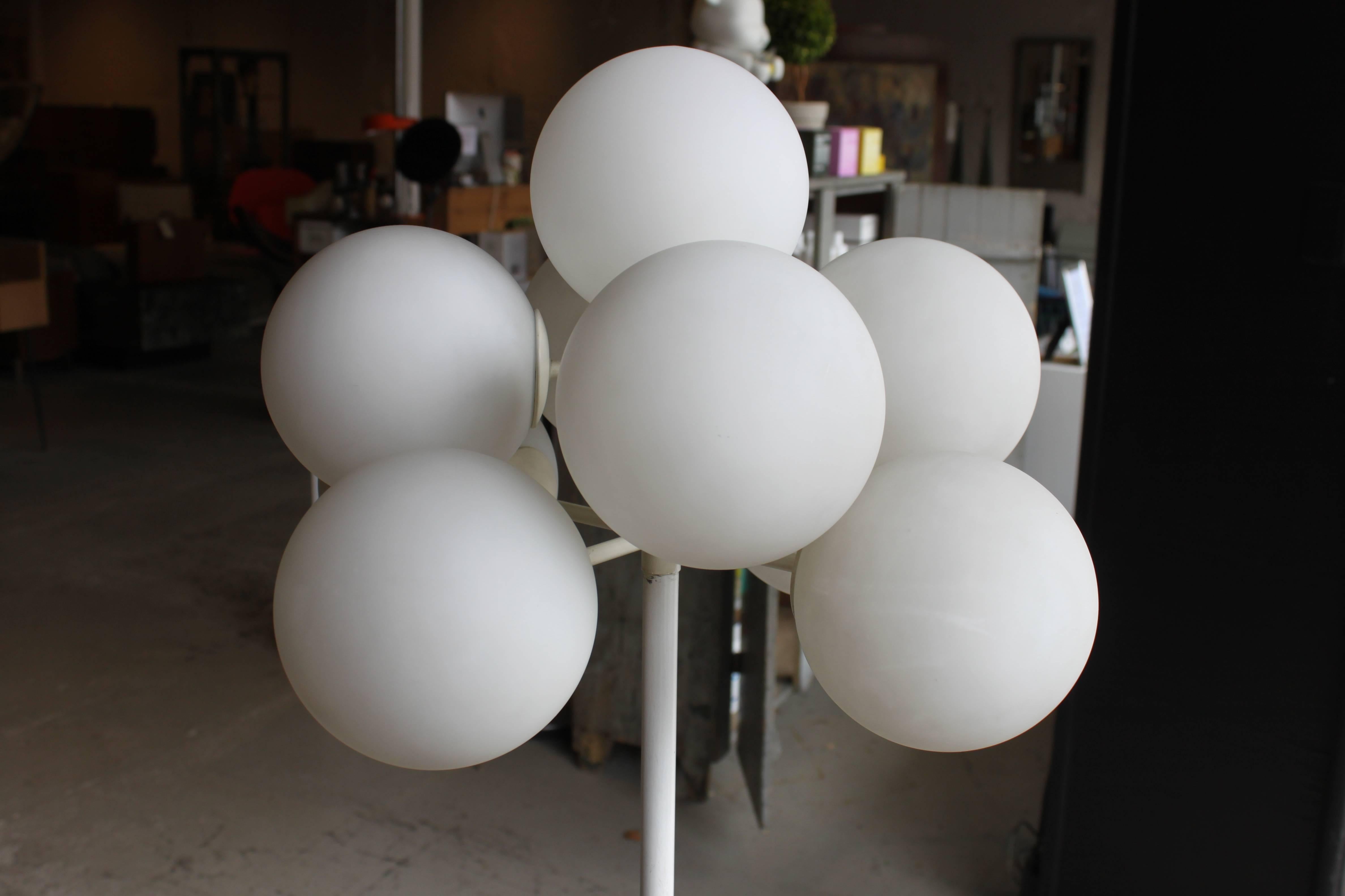 Vintage Swiss floor lamp designed by Max Bill. There are nine frosted glass globes. Condition appropriate with age and use.