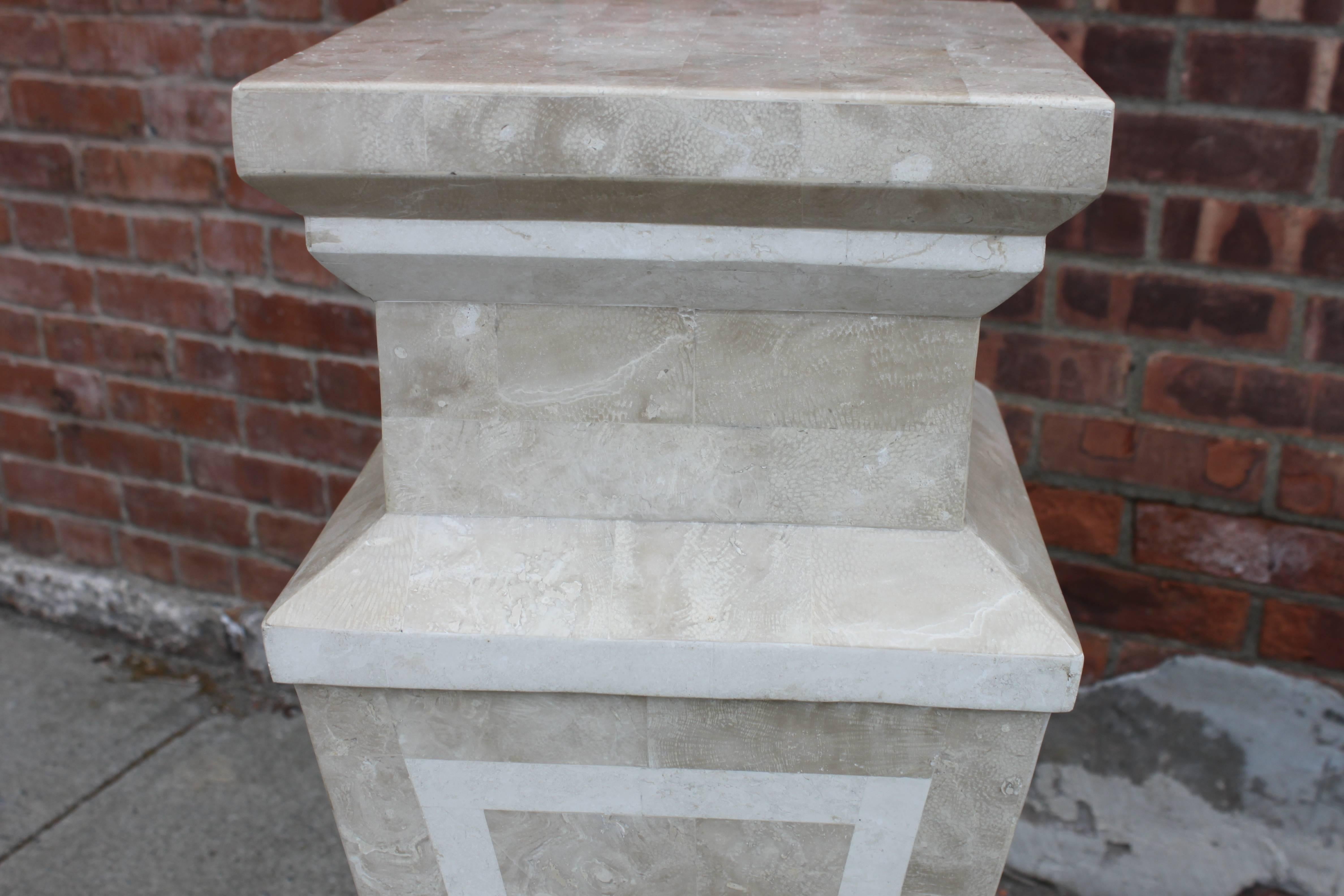 Tessellated stone pedestal, circa 1980s. Slight surface damage on one lower corner but hardly noticeable, please see pictures. Overall in very good shape. Top of pedestal is 12