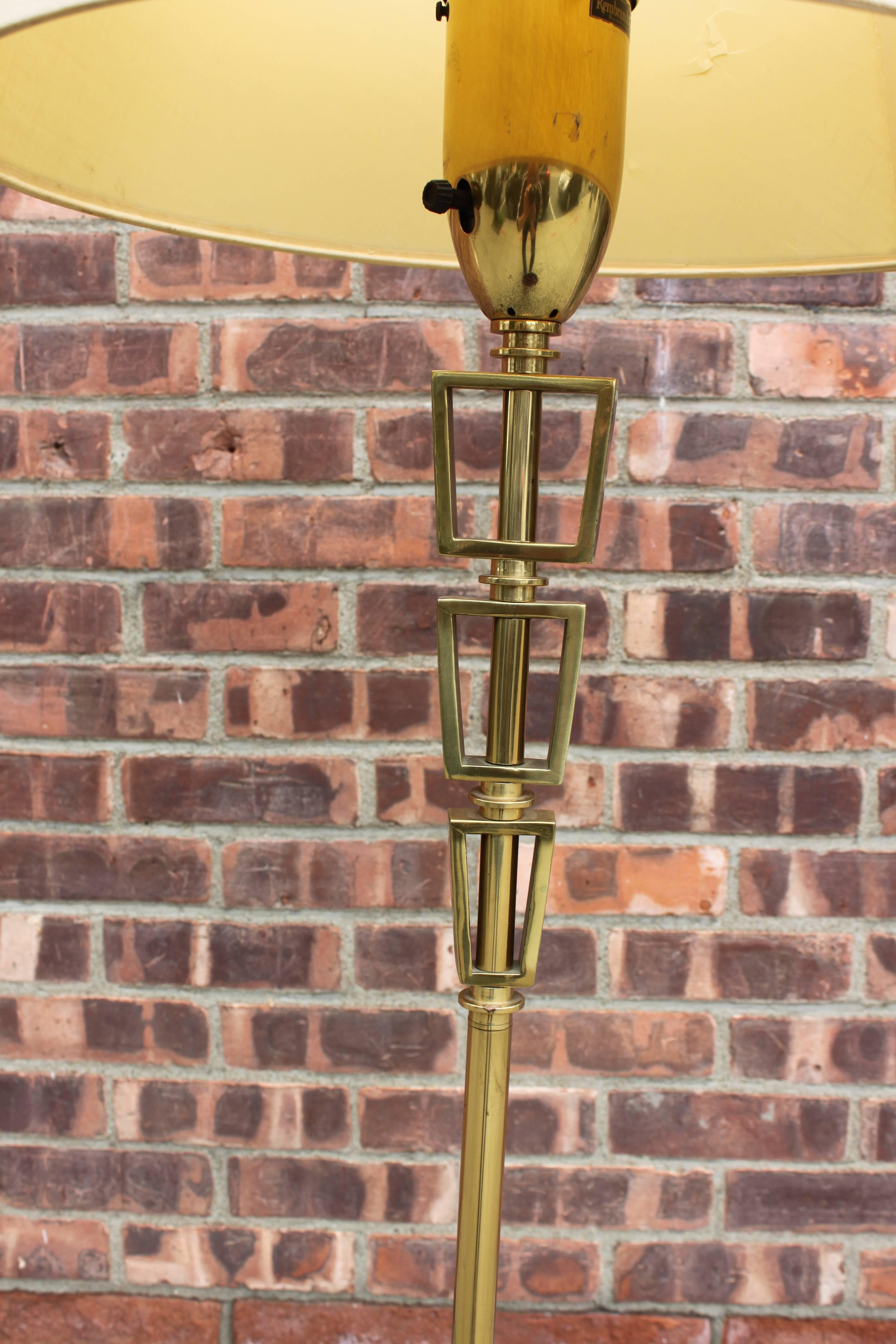Marked Rembrandt Lamps. Beautiful Mid-Century Modern design in brass. Milk glass interior shade. Height measurement to the top of the interior milk glass shade. Fabric shade has faults.