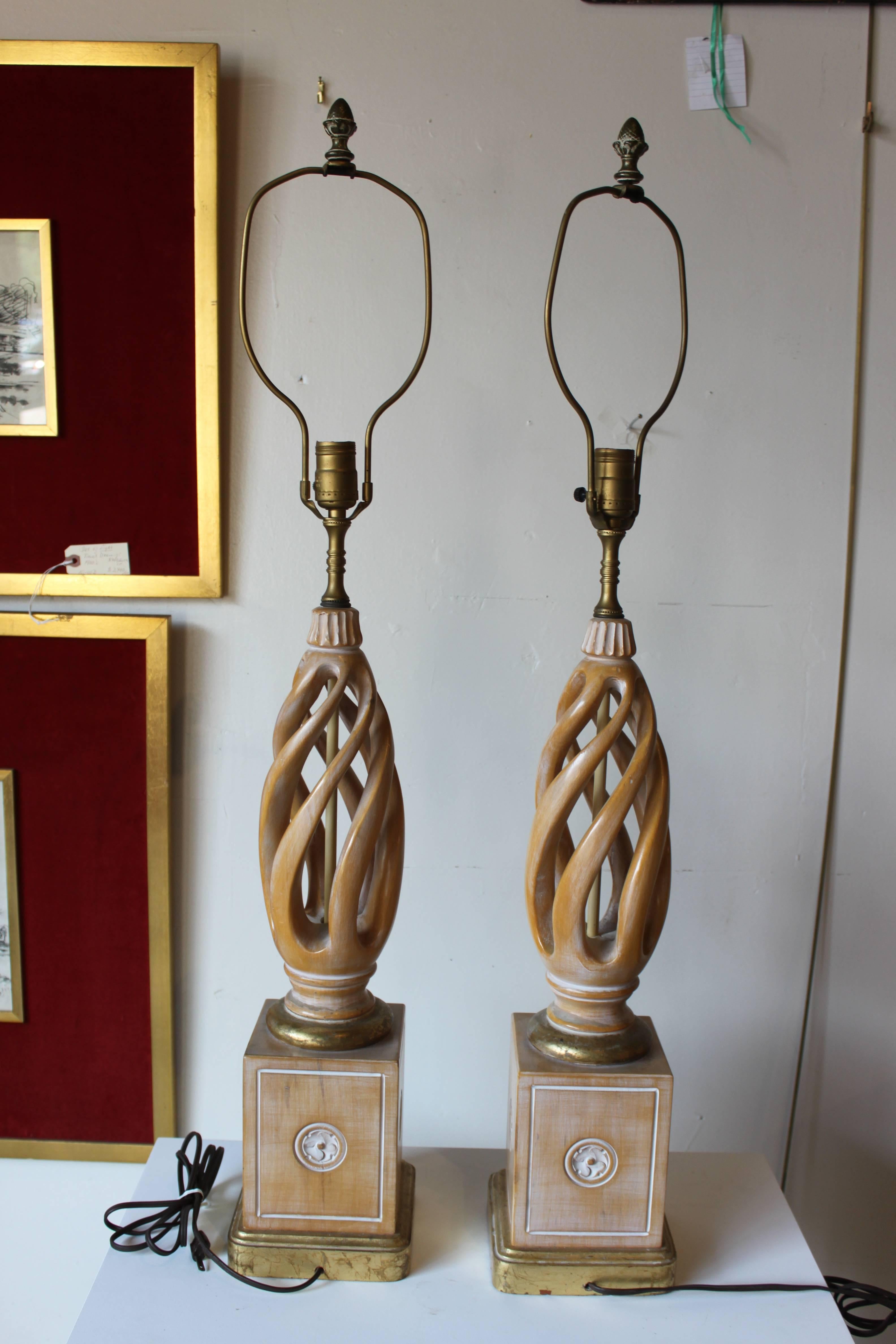 Pair of gilted and limed wood base lamps. Quality and workmanship on the lamps are great. Please see pictures. Height to top of carved wood base: 22".