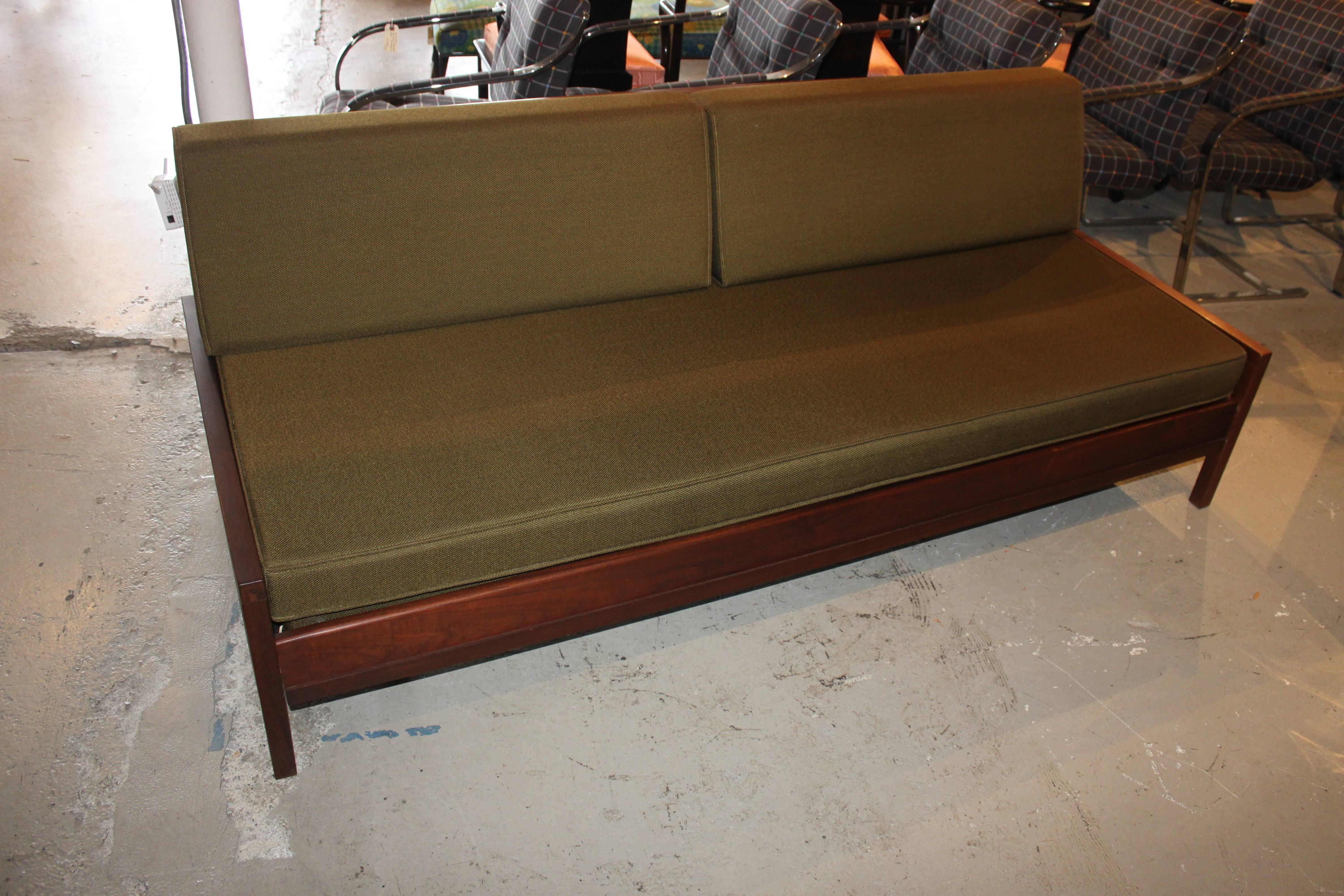 Mid-Century Modern daybed sofa with trundle. Comes with the original cushions at buyer's request. It is in very good shape. Solid walnut frame and simple modern design. Perfect for the space limited room or apartment. Measure: Seat height 15.75