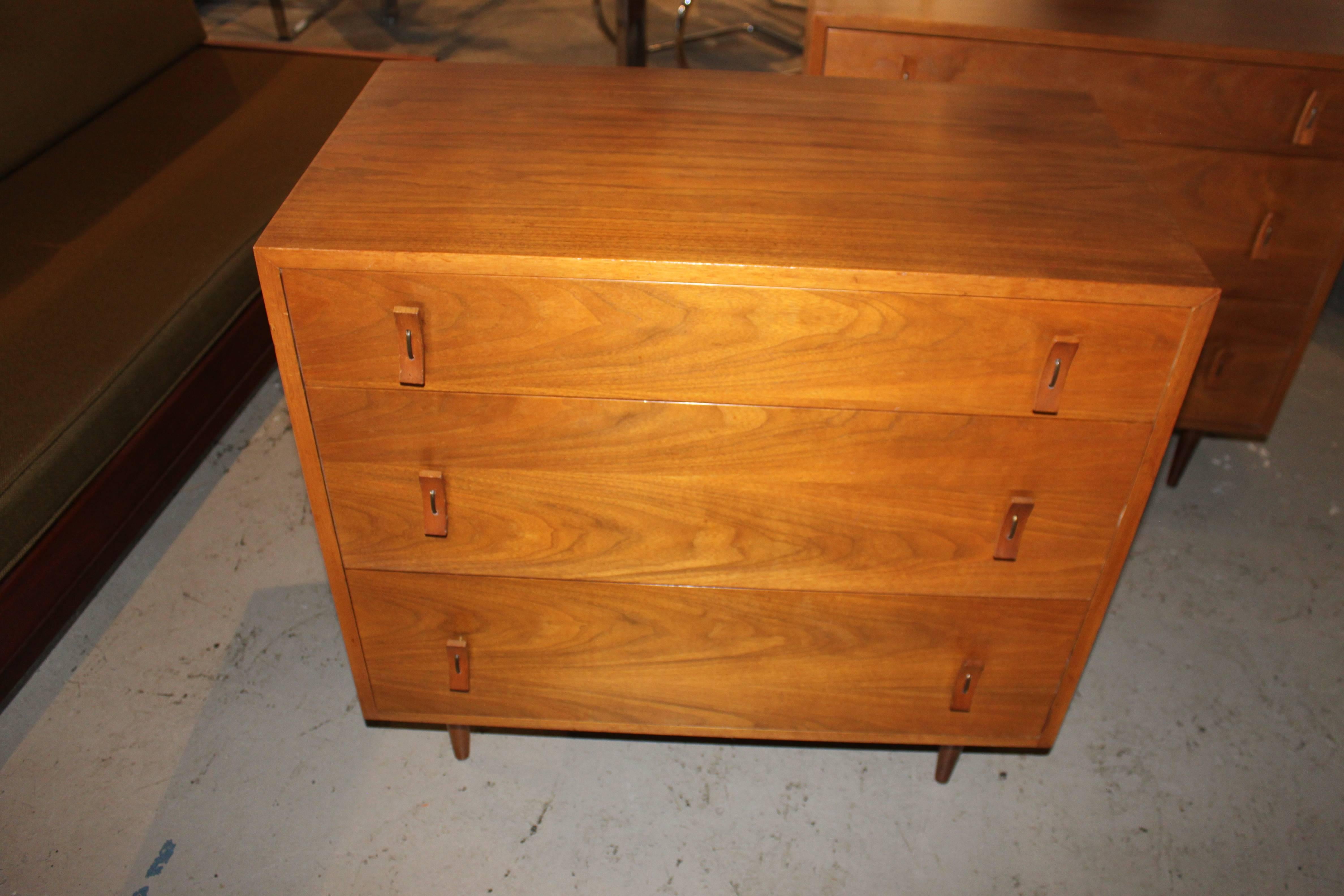 Pair of walnut dressers by Glenn of California. In very good condition with no major issues to mention.