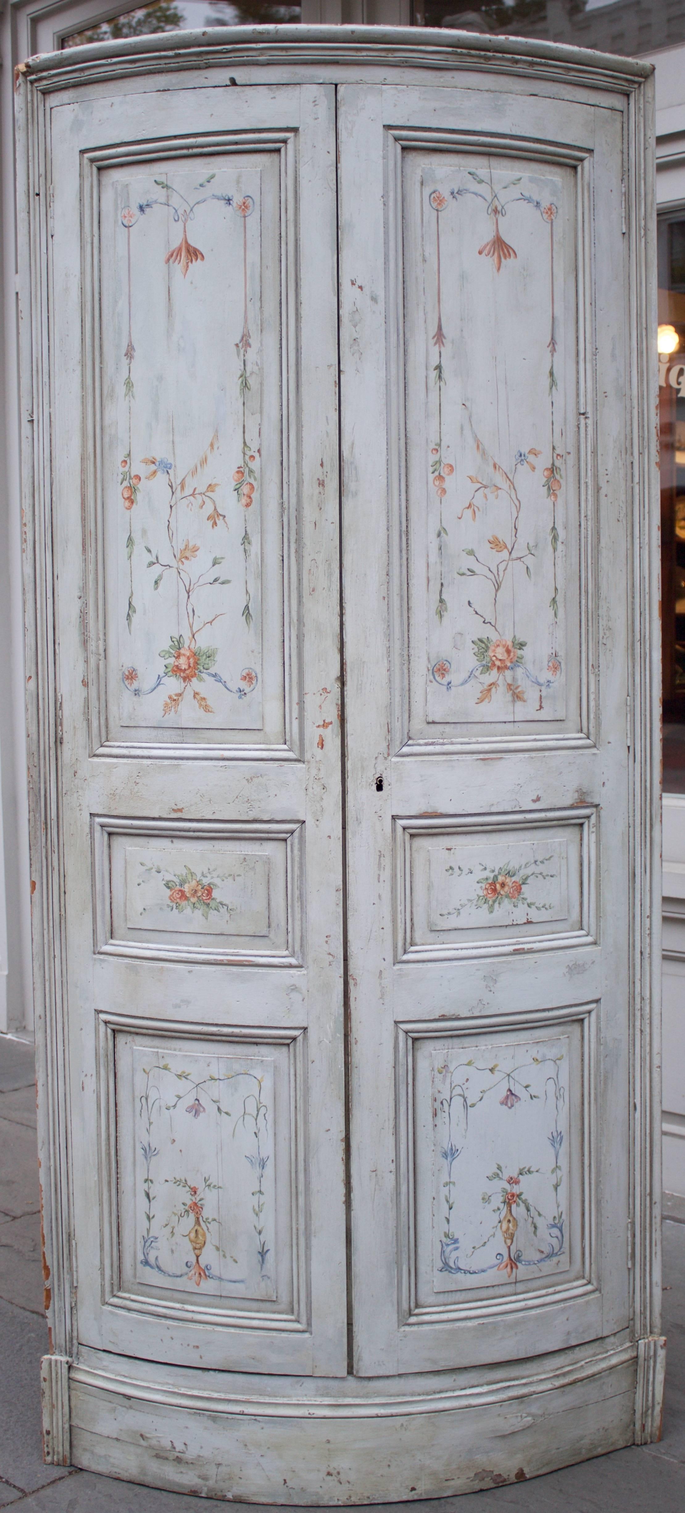 Superb and extremely rare Quot; Encoignures & Quot; (French name for corner cabinets). Rounded facade with folding doors, each having three arched panels in a double molding frame. Typical for the period, left door closes by a small latch hook and