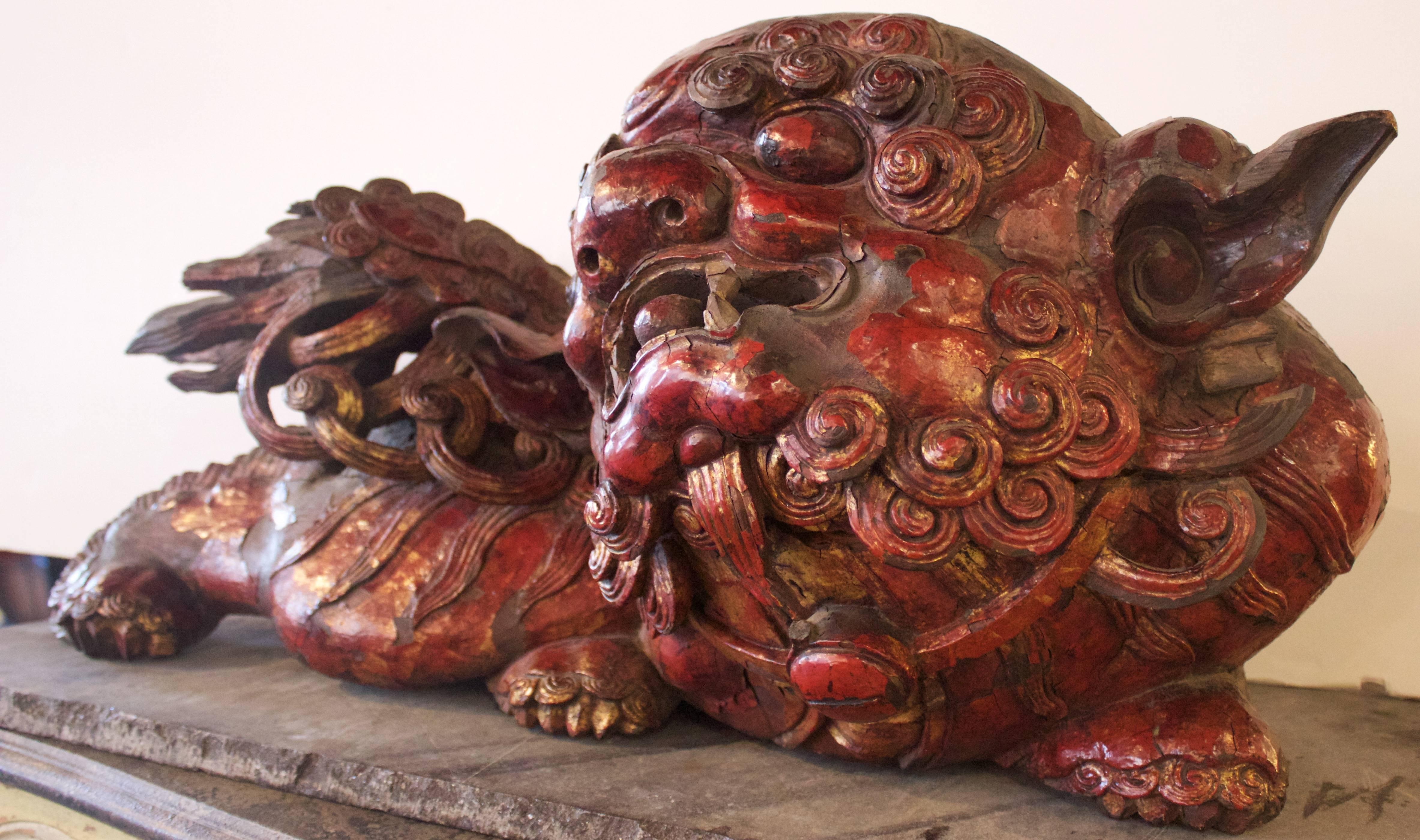 Made of lacquered hand-carved wood. This temple guardian posed as if reacting to and enemy.