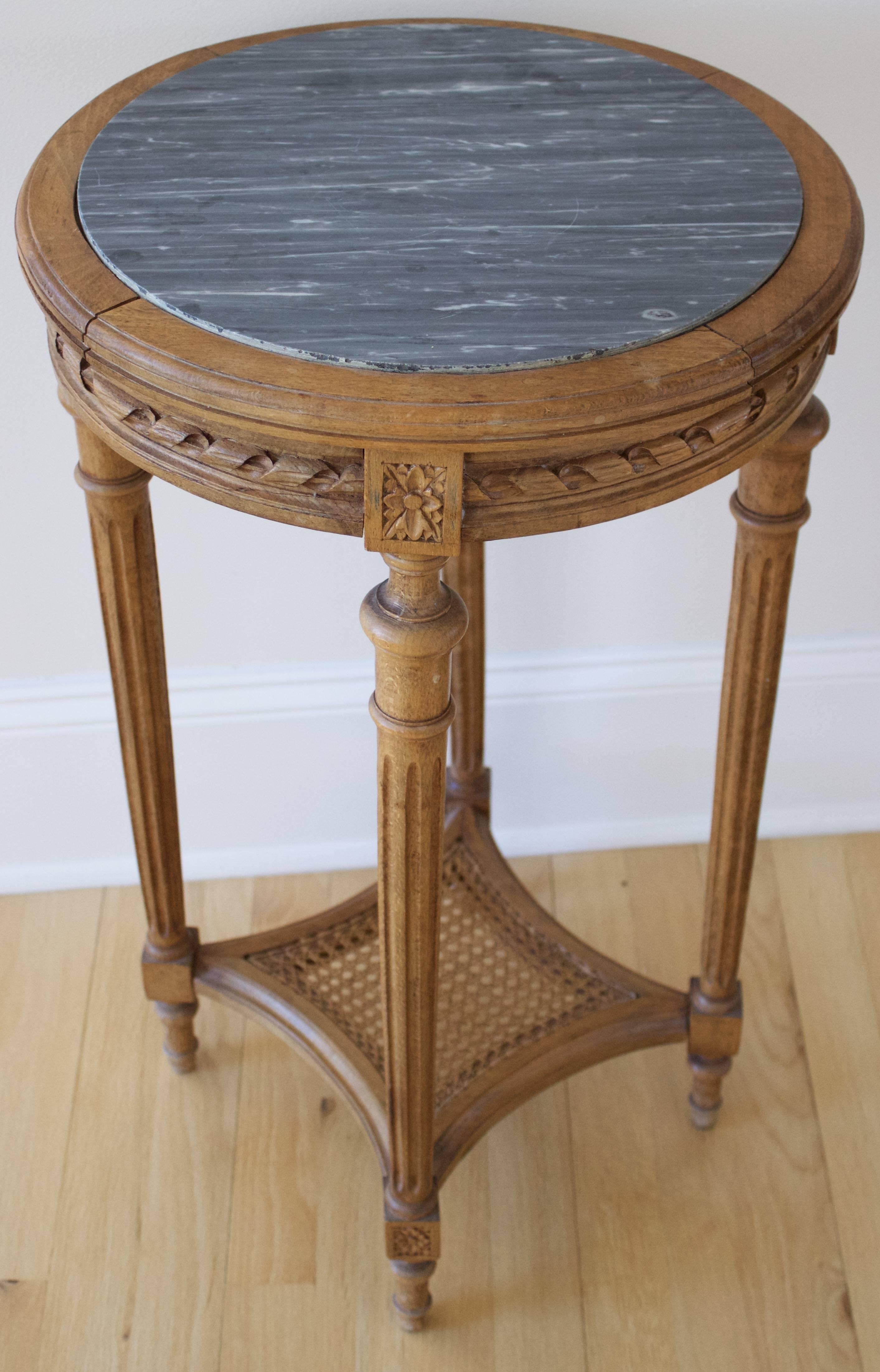 Gray Saint-Anne marble top insert on this beechwood table made in Louis XVI style. Carved 
