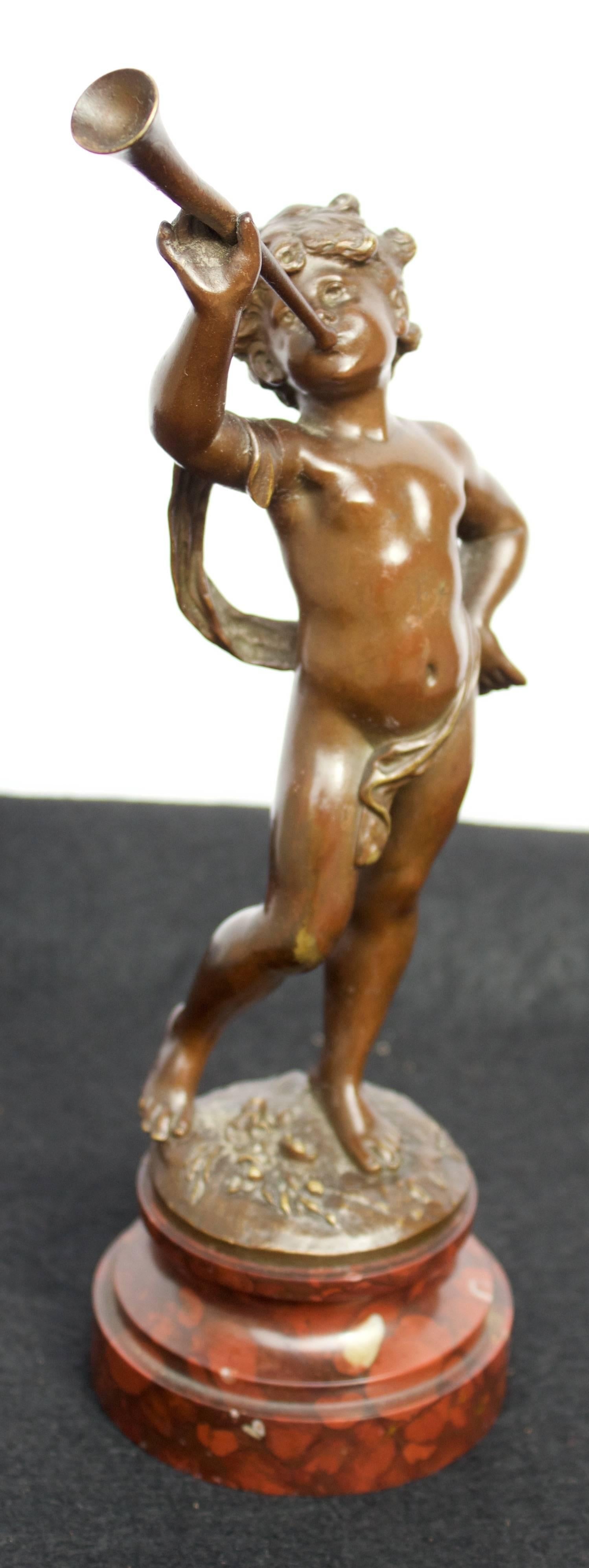 Adorable bronze with a great 19th century casting and a superb
platina. A. Moreau style both realist and graceful connect him 
well to the other members of Moreau's dynastie.
Stands on circular stepped red marble. Terrace signed 