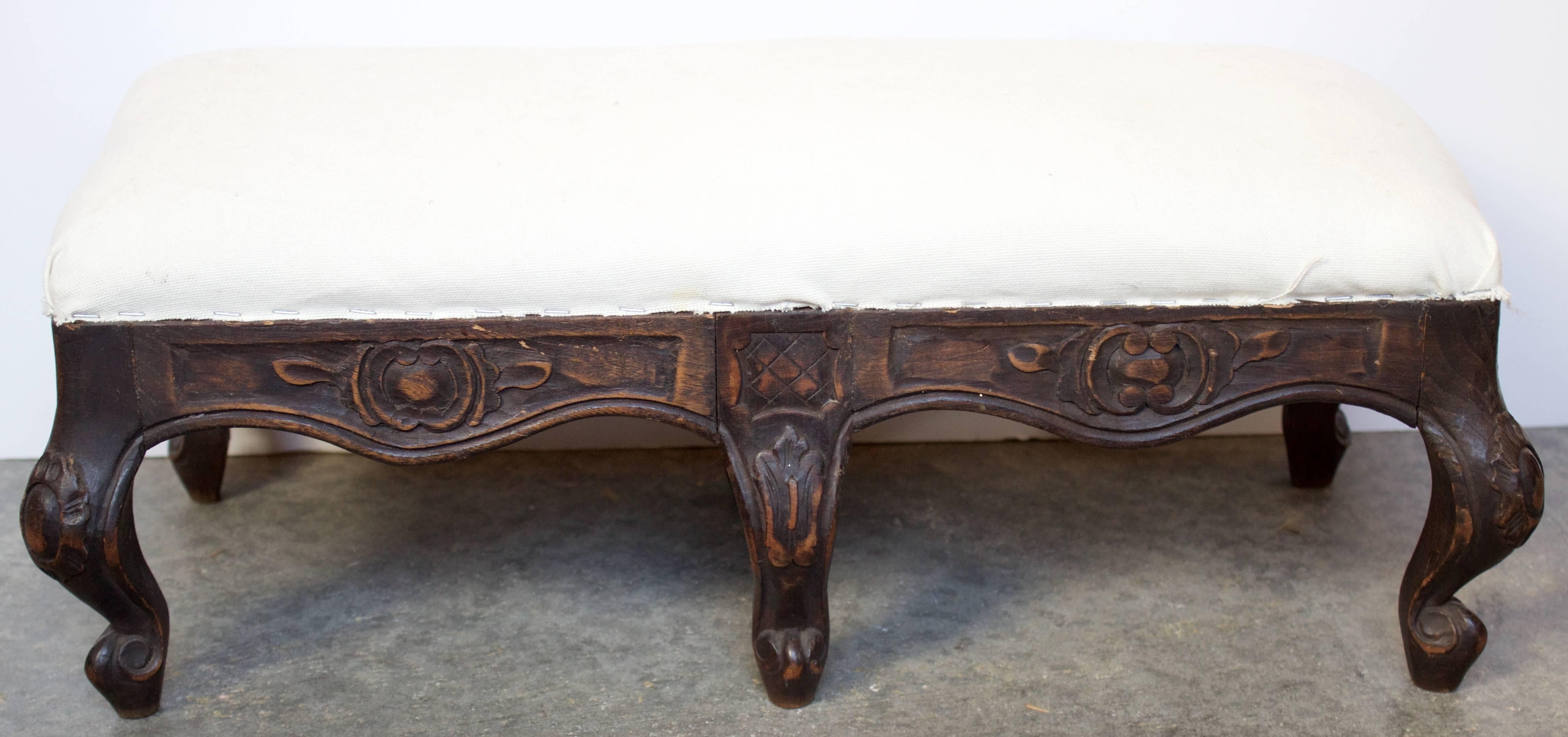 Provencial Louis XV style footstool made of beechwood and finished in a walnut brown. Stool is horsehair stuffed and ready for fabric.
  