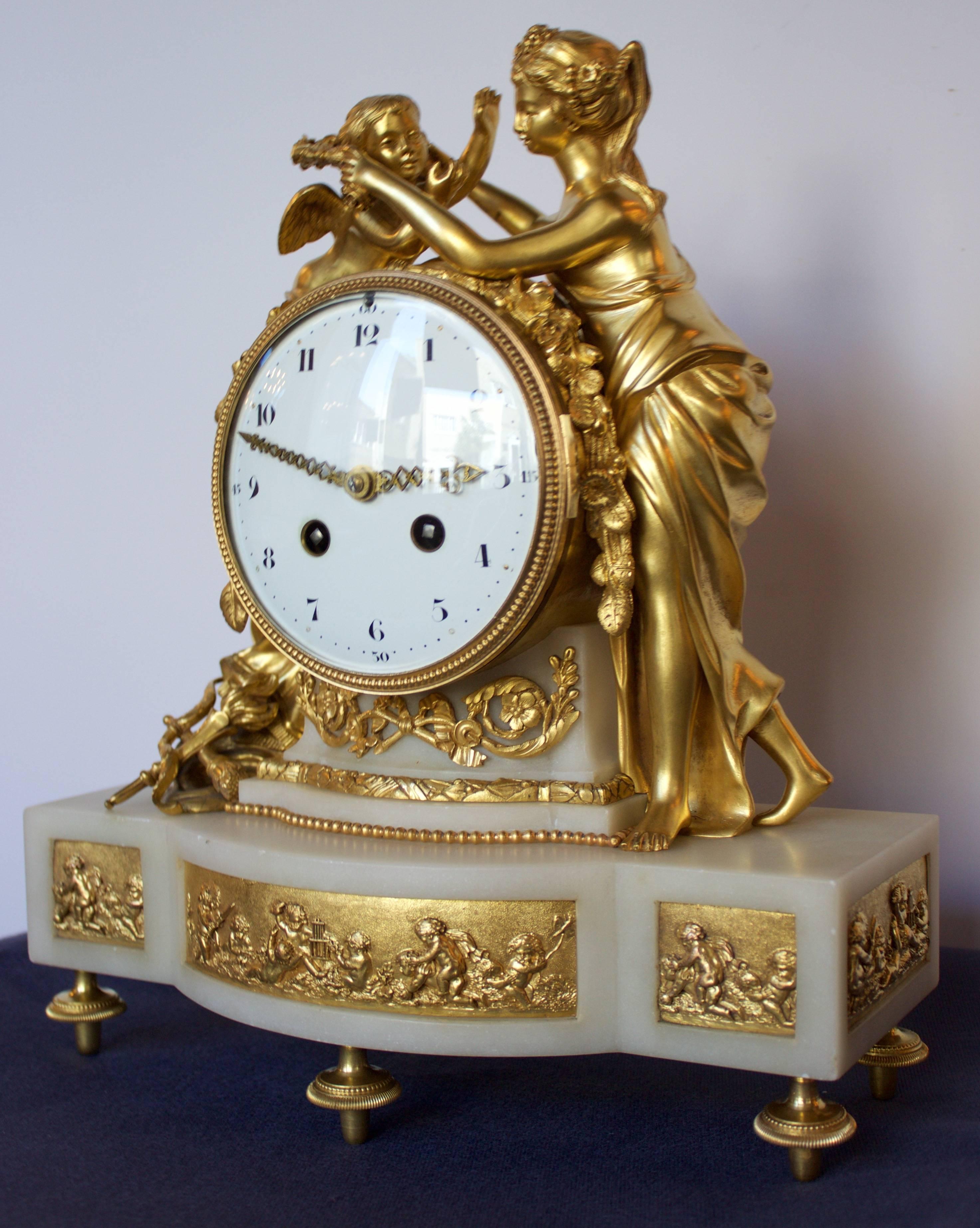 Magnificent and refined clock made under Napoleon III time after a model registered by Francois Vion (Bronze Master) in 1786 in Paris, under Louis XVI reign.
 Structure in finely chased and gilded bronze figuring the allegory of Psyche enlacing her