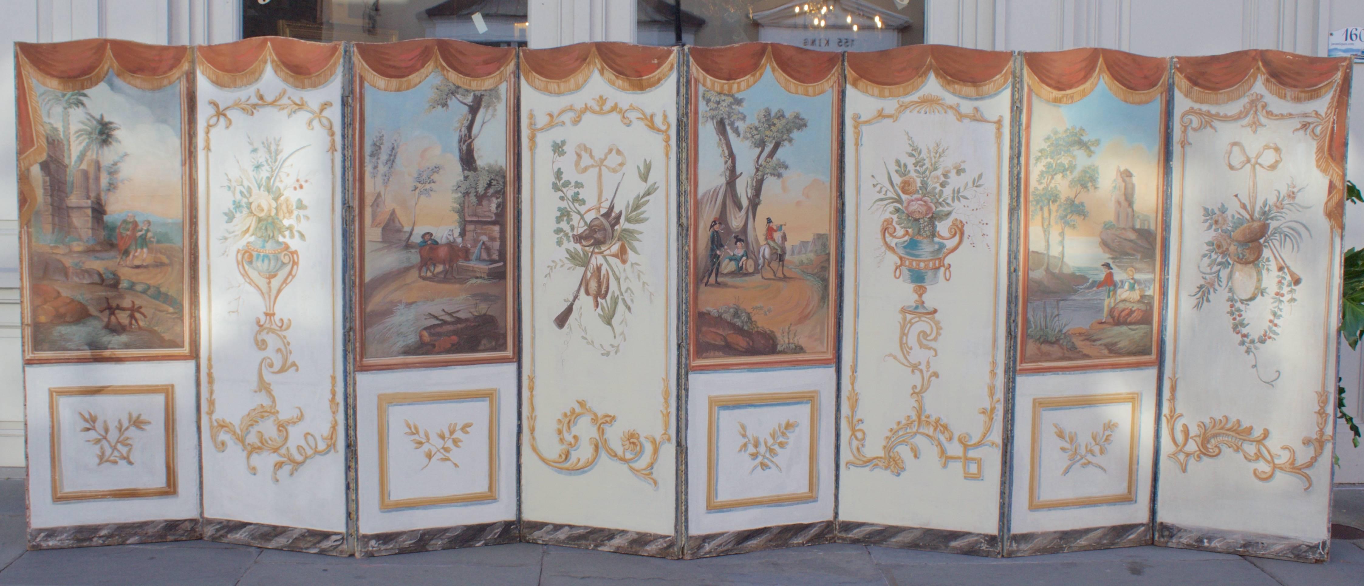 Fine Louis XVI period screen with its gray painted wooden frame decorated by hand painting on both sides of the canvas.
One side has four panels ornated by acanthus leaves, flowery vase ,hunting and musical trophies in alternance with four panels