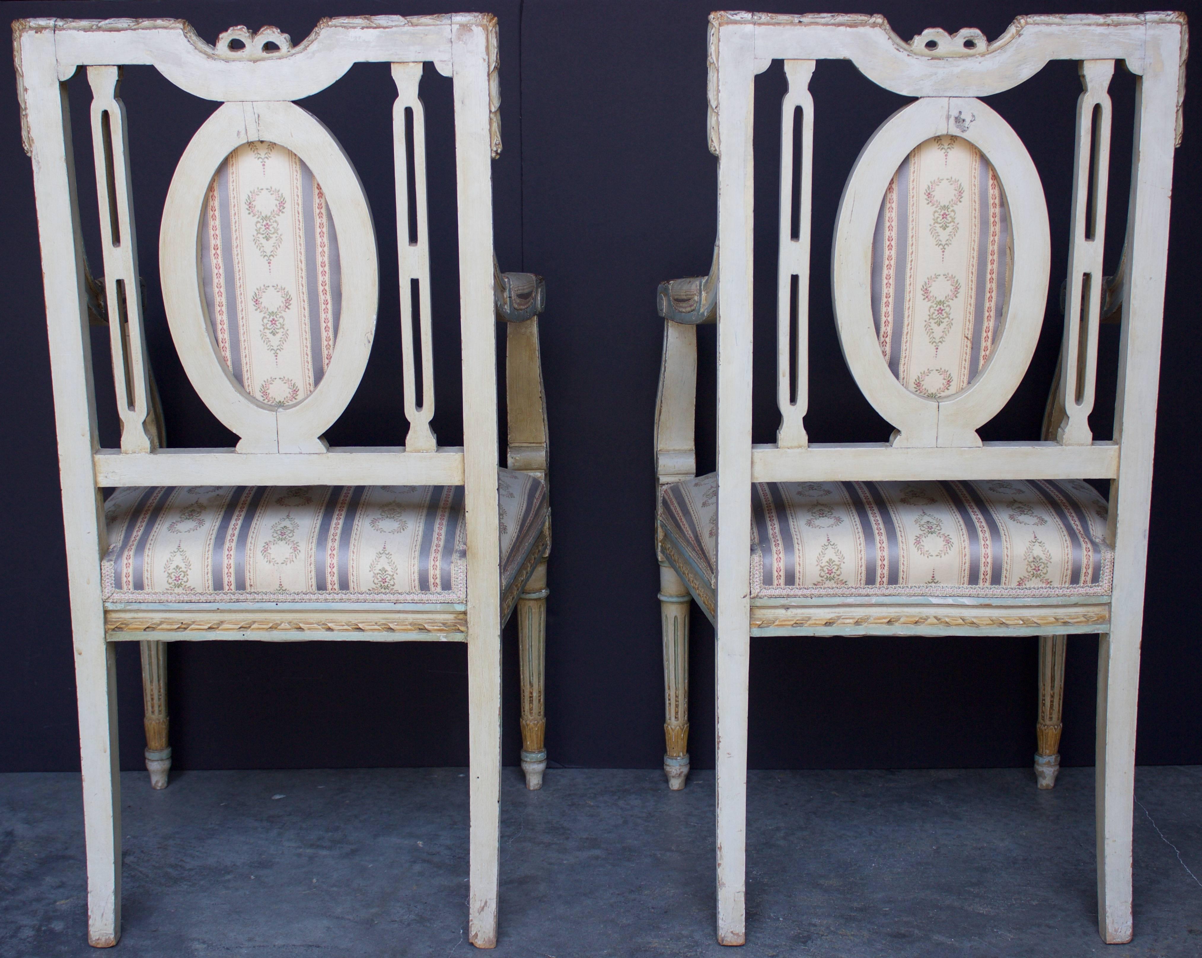 Hand-Carved Pair of French Louis XVI Period Armchairs For Sale