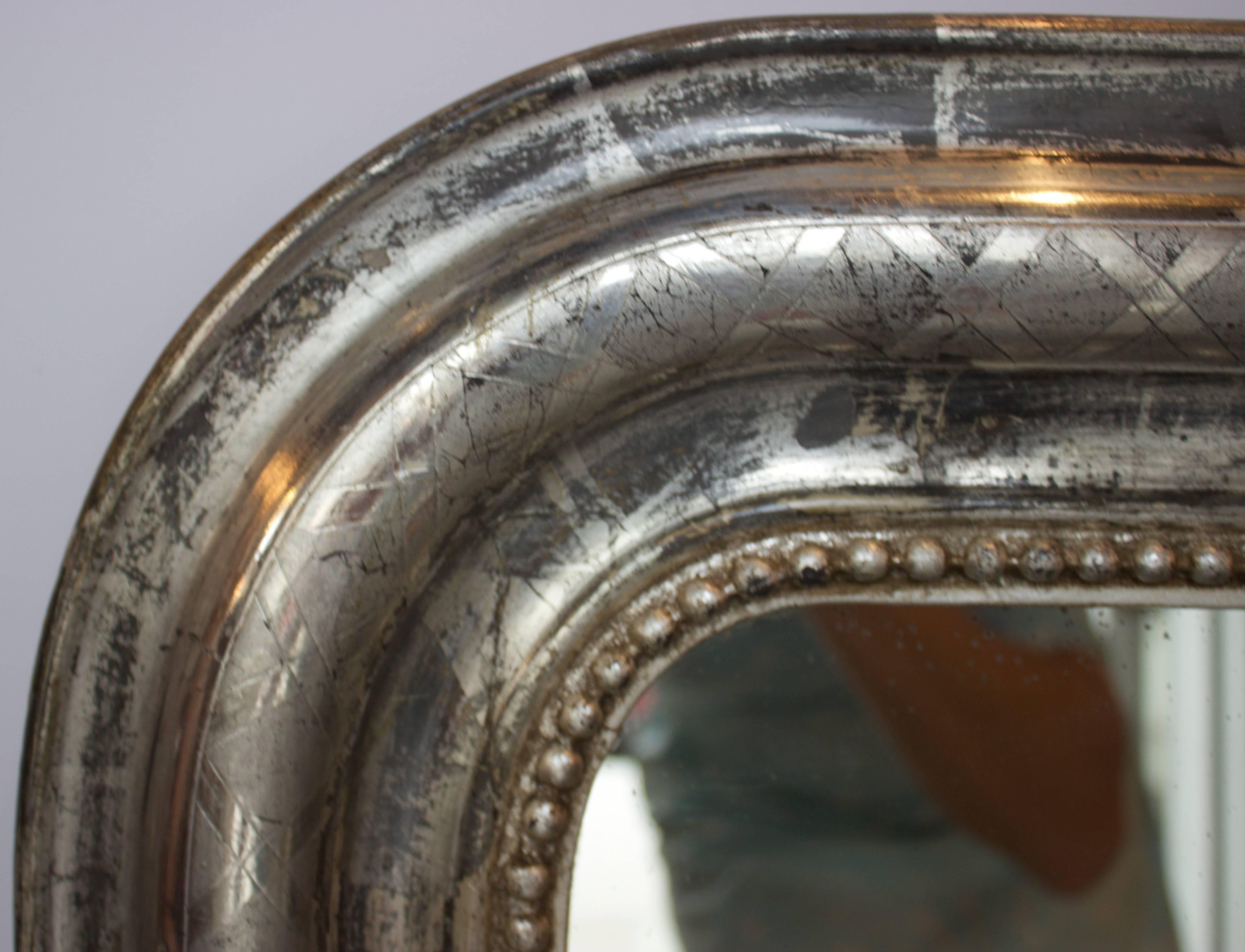 Hand Carved and Silver Gilt Louis Philippe Mirror with Lattice Carving and a Row of Carved and Silver Gilt Pearls. Mirror has its original Silvered Glass Mirror and Wooden Back.