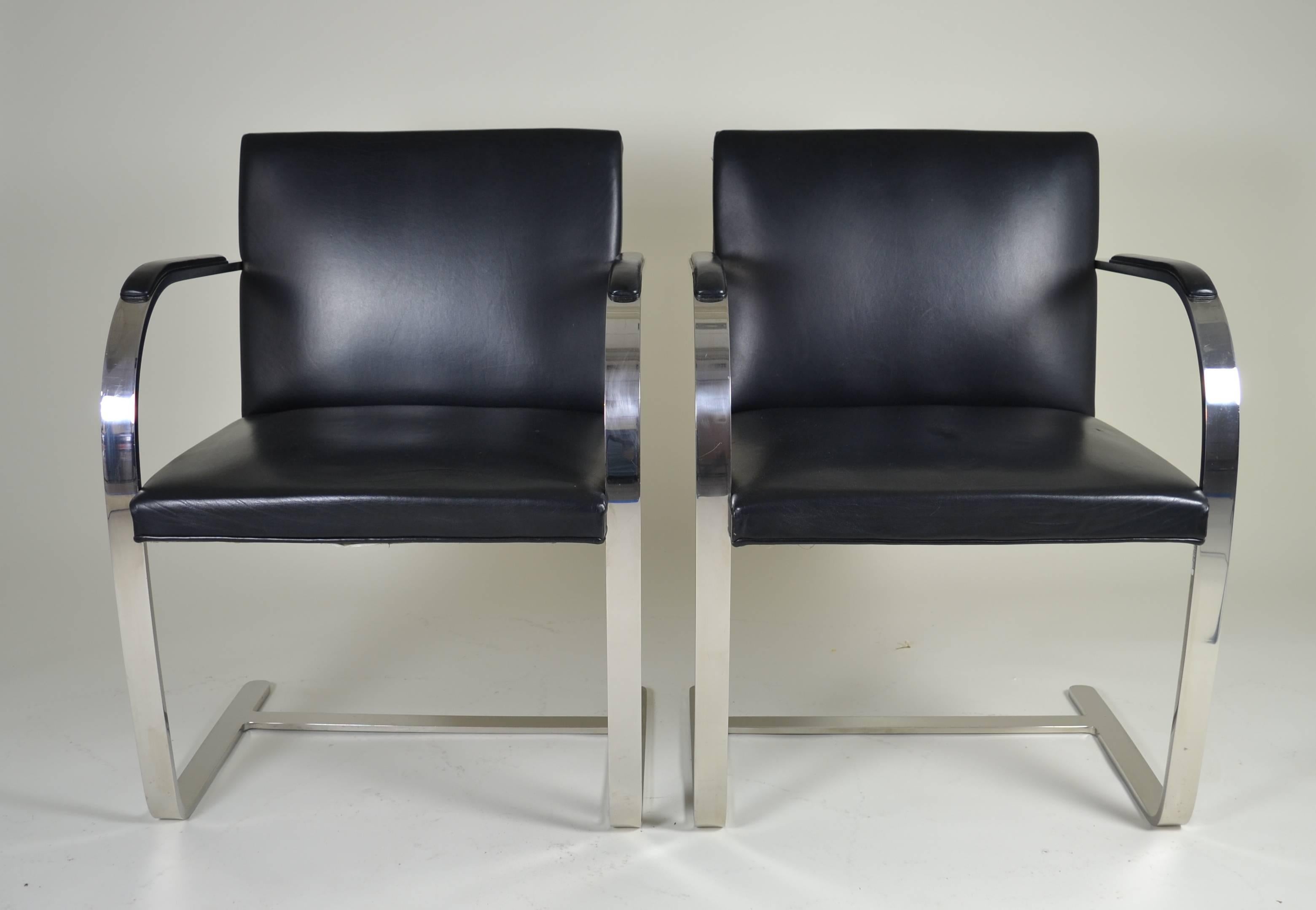 A nice pair of vintage Brno designed by Ludwig Mies van der Rohe, circa 1930. Complete with nice Knoll labels in steel and black leather. Generally very good condition. Some minor scratches on steel, leather shows almost no wear.