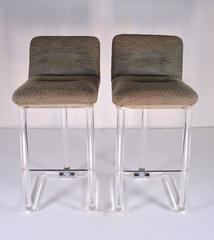 Pair of Lion in Frost Swivel Bar Stools in Lucite, circa 1970s