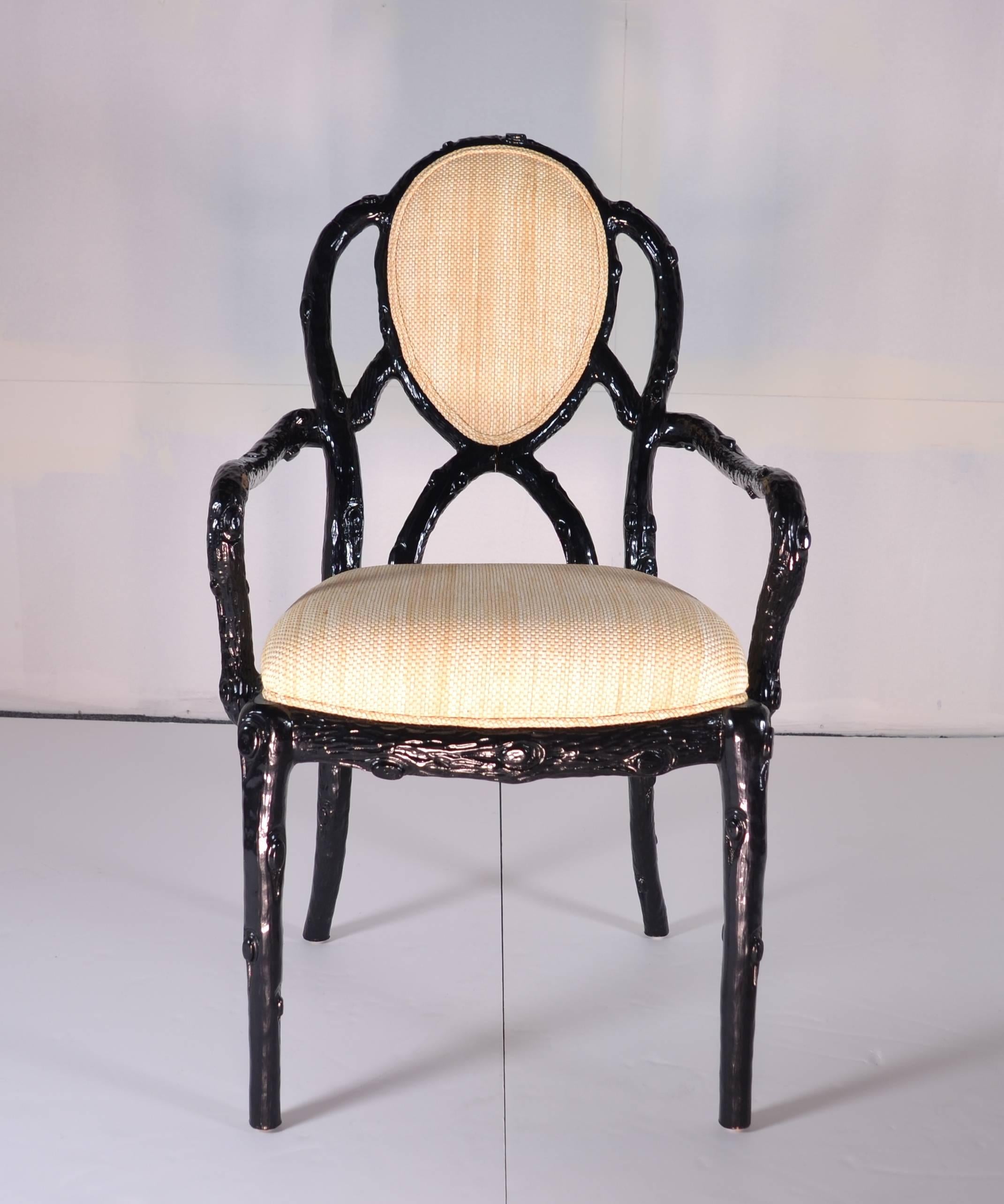 Striking faux bois frames in gloss black with a natural woven cover. Two arms and six sides. Good size and comfortable. Very good condition. See detail photos. The arm chairs measure: 23.5" W X 26" D X 39.5 H; the side chairs measure: