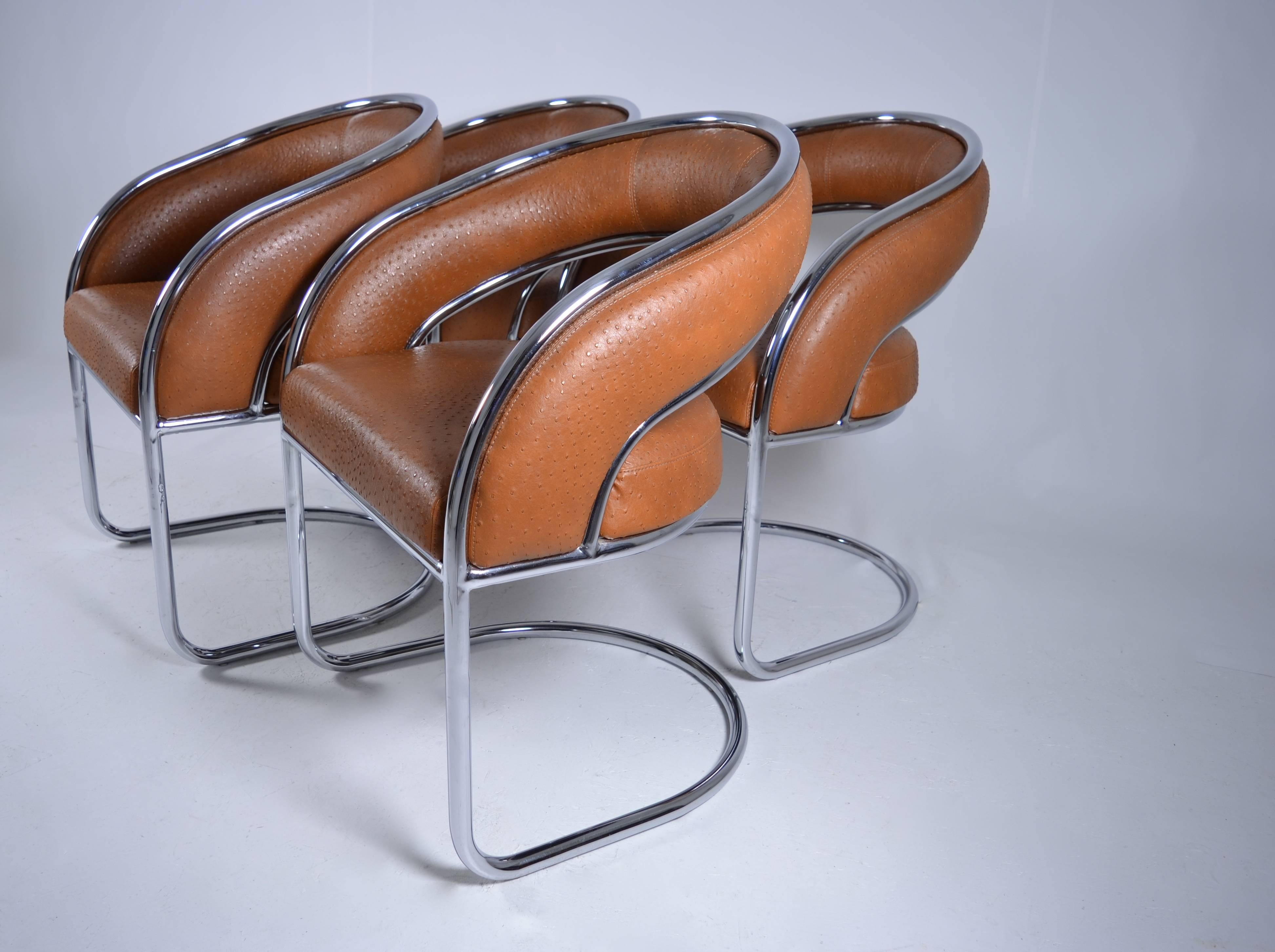 Barrel-back form chairs in quality faux ostrich. Presented by Thonet in the mid-1970s. Excellent condition.