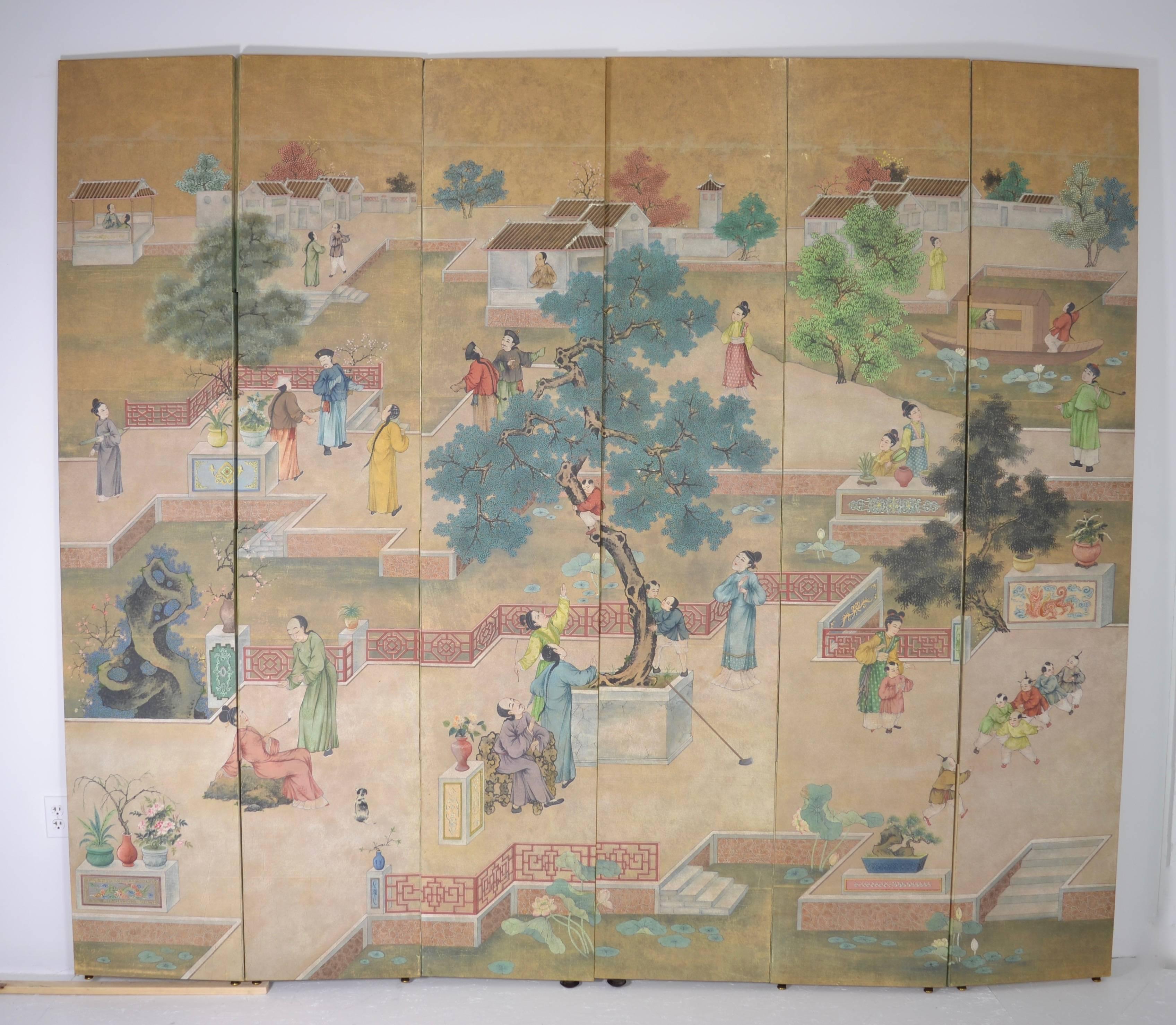 Beautifully hand-painted with genre scenes, a wall paper mural applied to six screen panels. Verso is the distinctive Gracie gilt patch paper, circa 1980s. In excellent condition. Currently in two three-panel sections; easily connected if desired.