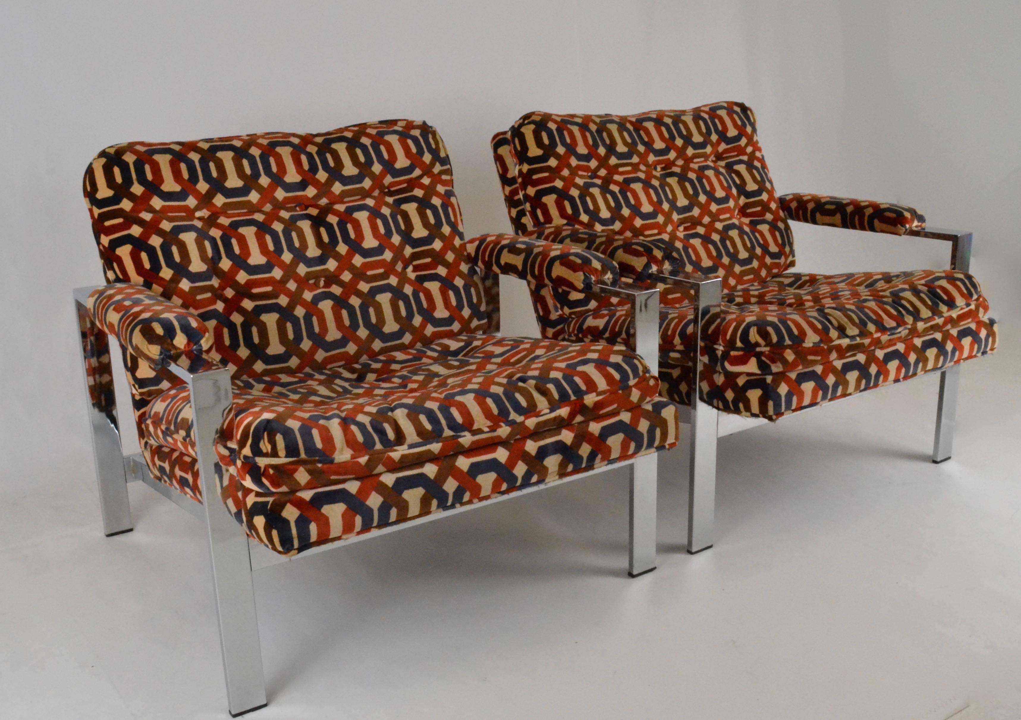 A terrific pair with original upholstery. Chrome in very good condition: Upholstery is clean but worn and should be replaced.