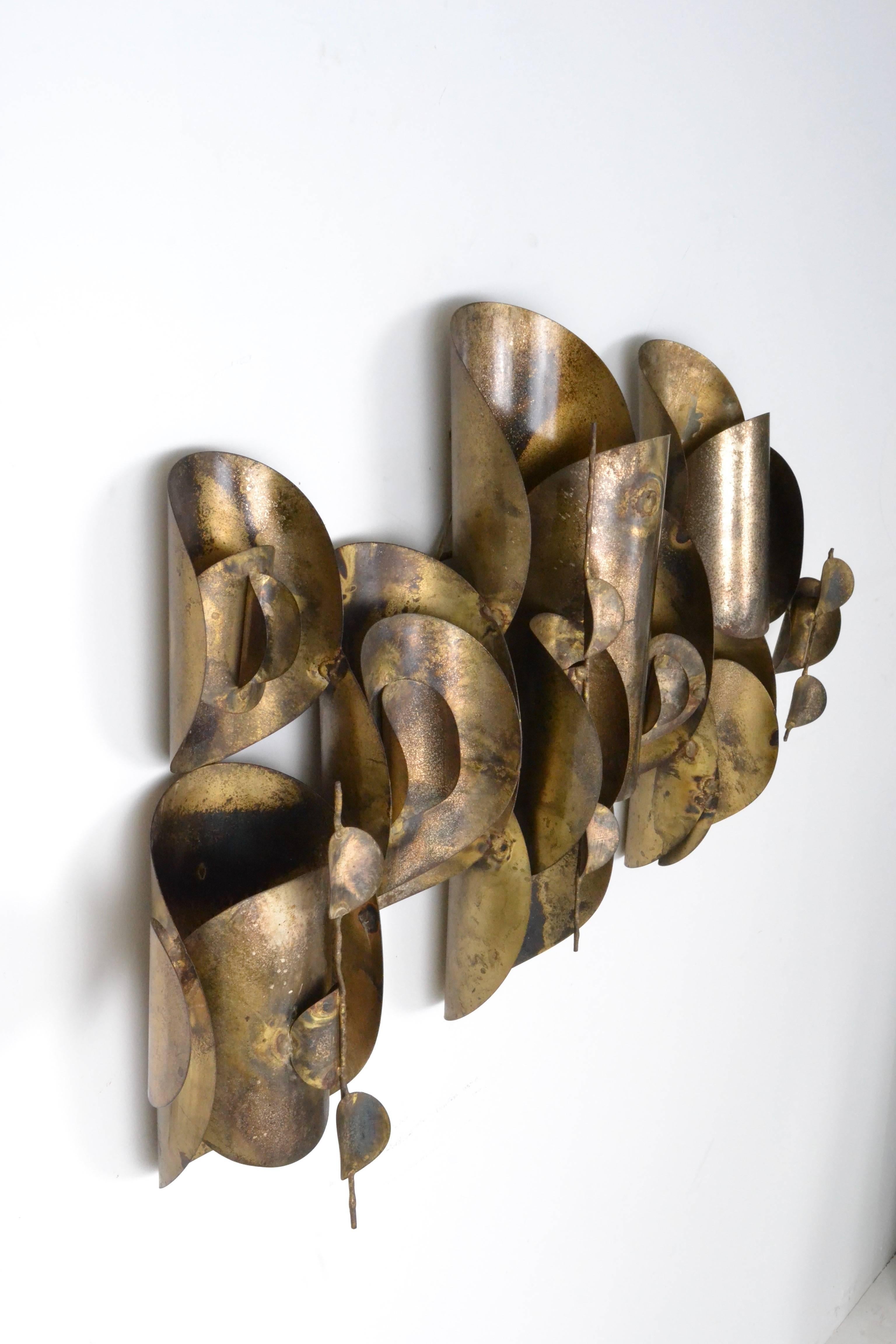 Mid-Century Modern gilt patinated wall sculpture. Nice form and construction.