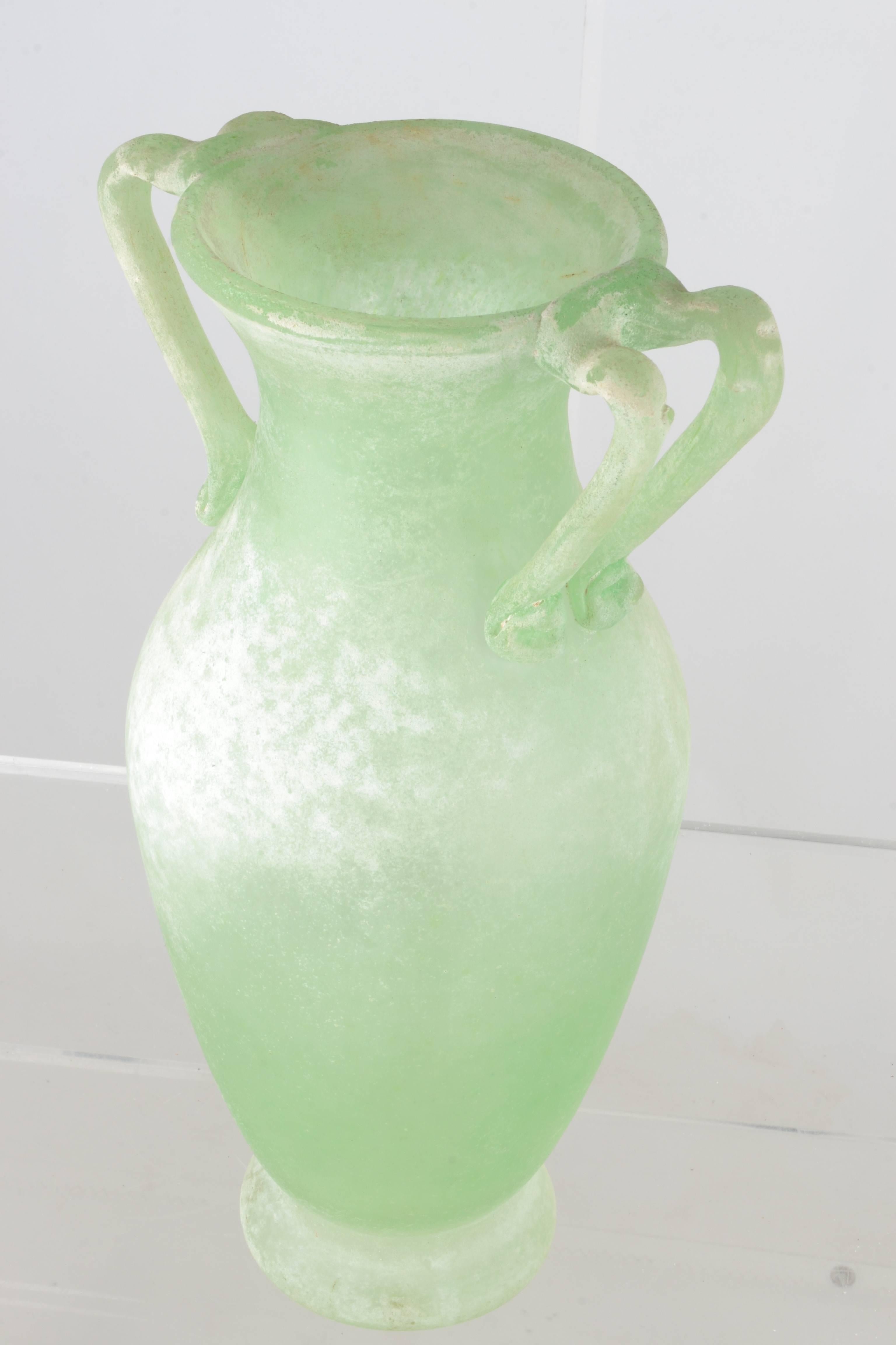 Wonderful pale green in elegant form with applied double handles. Handblown, Murano, Italy, circa 1970s.