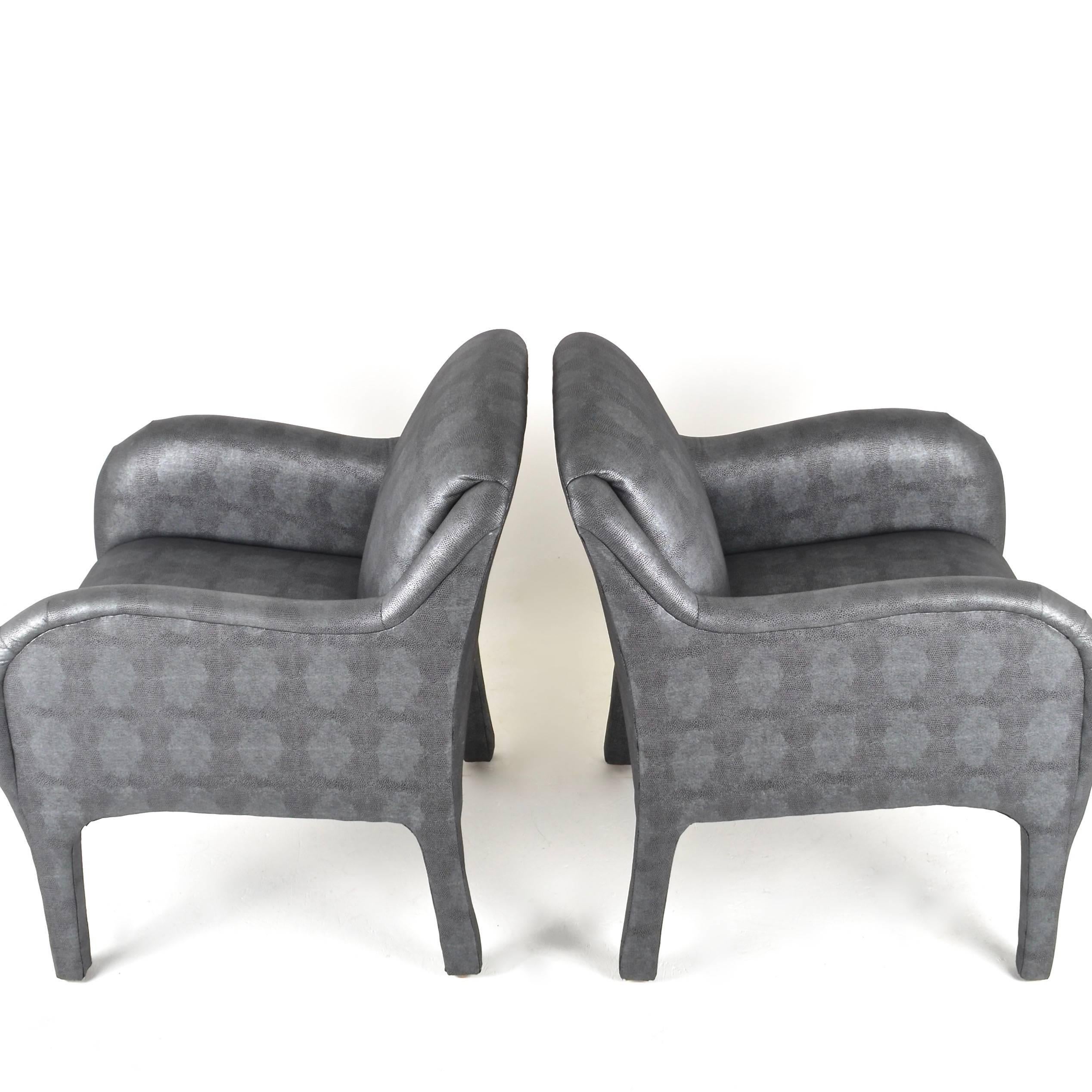 Super chic pair of chairs with metallic shagreen patterned upholstery fabric. In excellent condition.
