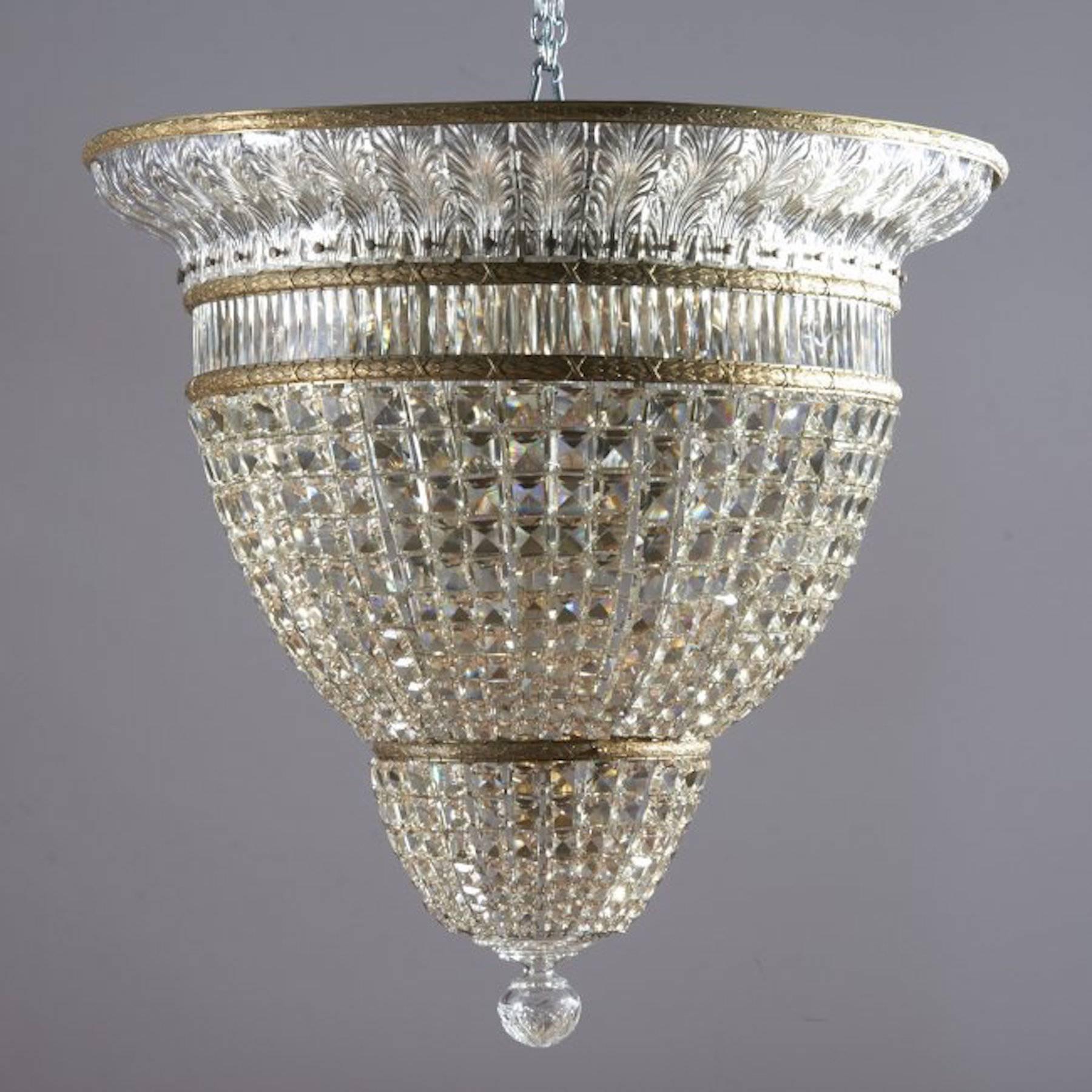 Pair of large Art Deco baccarat  Plafonniers (flush/ ceiling pendant)  crystal, gilt-bronze chandeliers tiered design with molded leaves and prism chains, each one 30