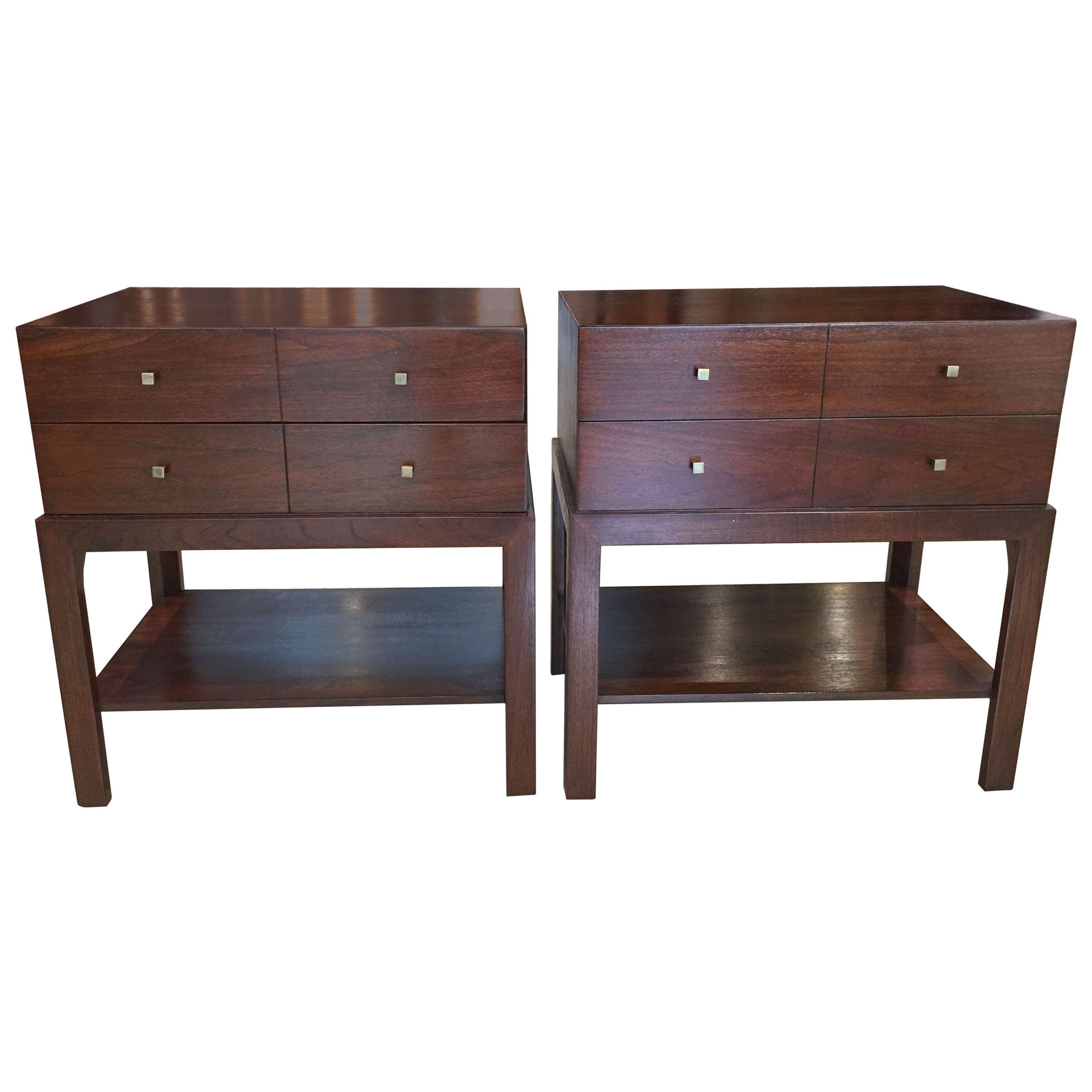 A pair of handsome Parzinger style nightstands by Albert Furniture Company. Rich mahogany and brass knobs.