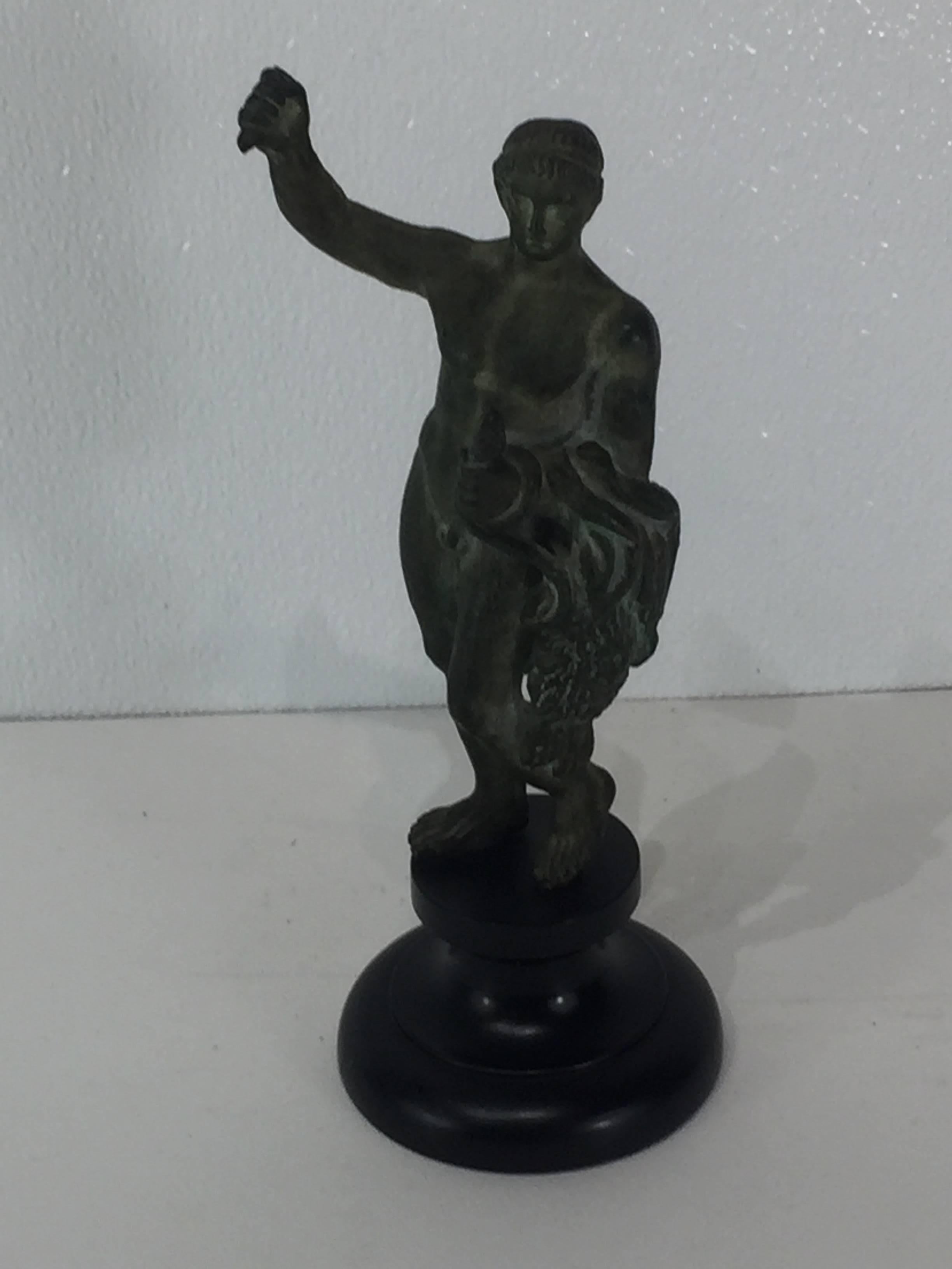 Grand Tour standing Hercules bronze, After the antique Roman bronze figure of Hercules holding a serpent, lion skin and club, His upright arm is holding a missing element, possibly a torch. Very heavy casting. The figure stands 8.5