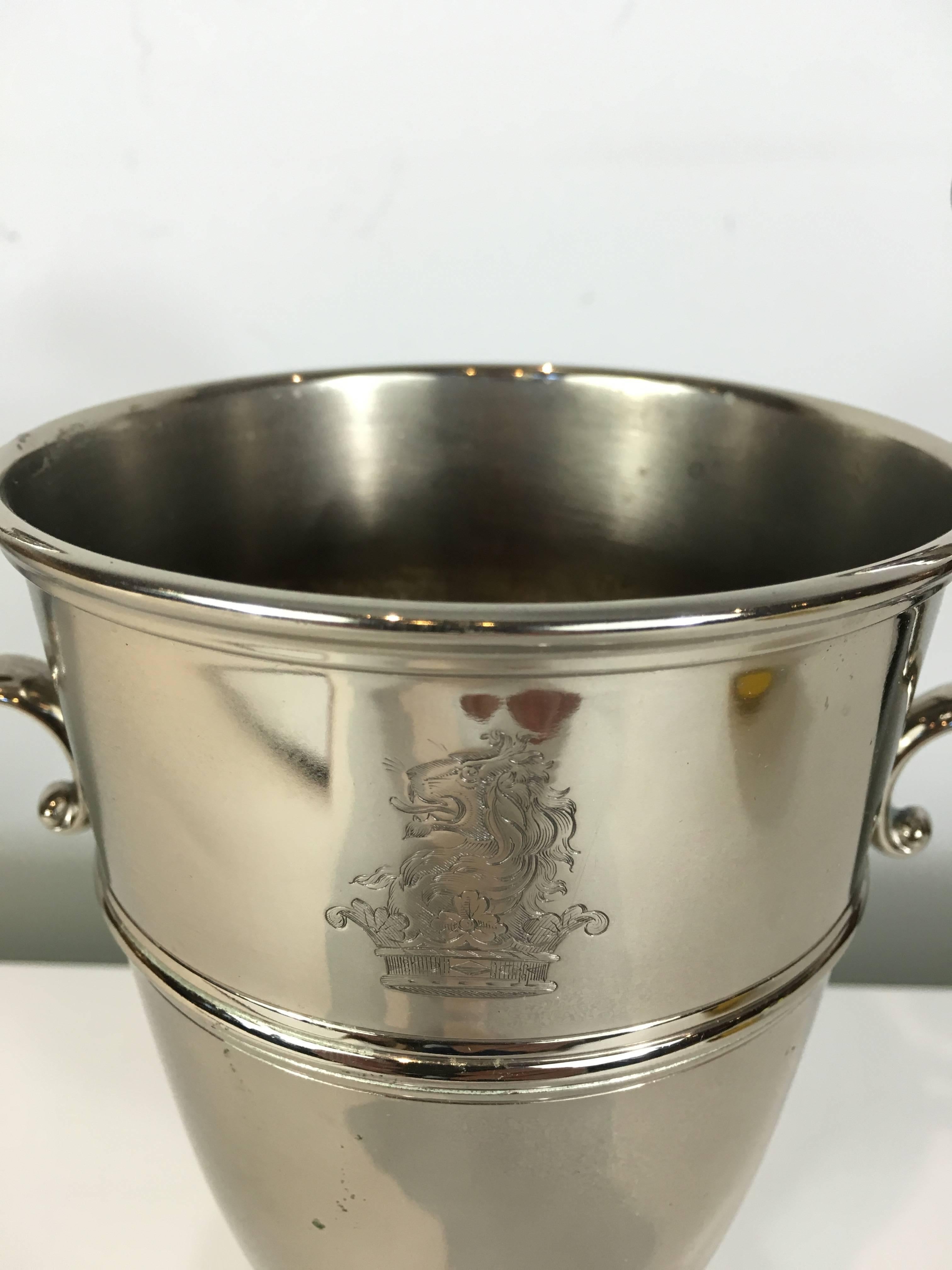 Sheffield plate armorial crested loving cup, of typical form with lion and crown crest.