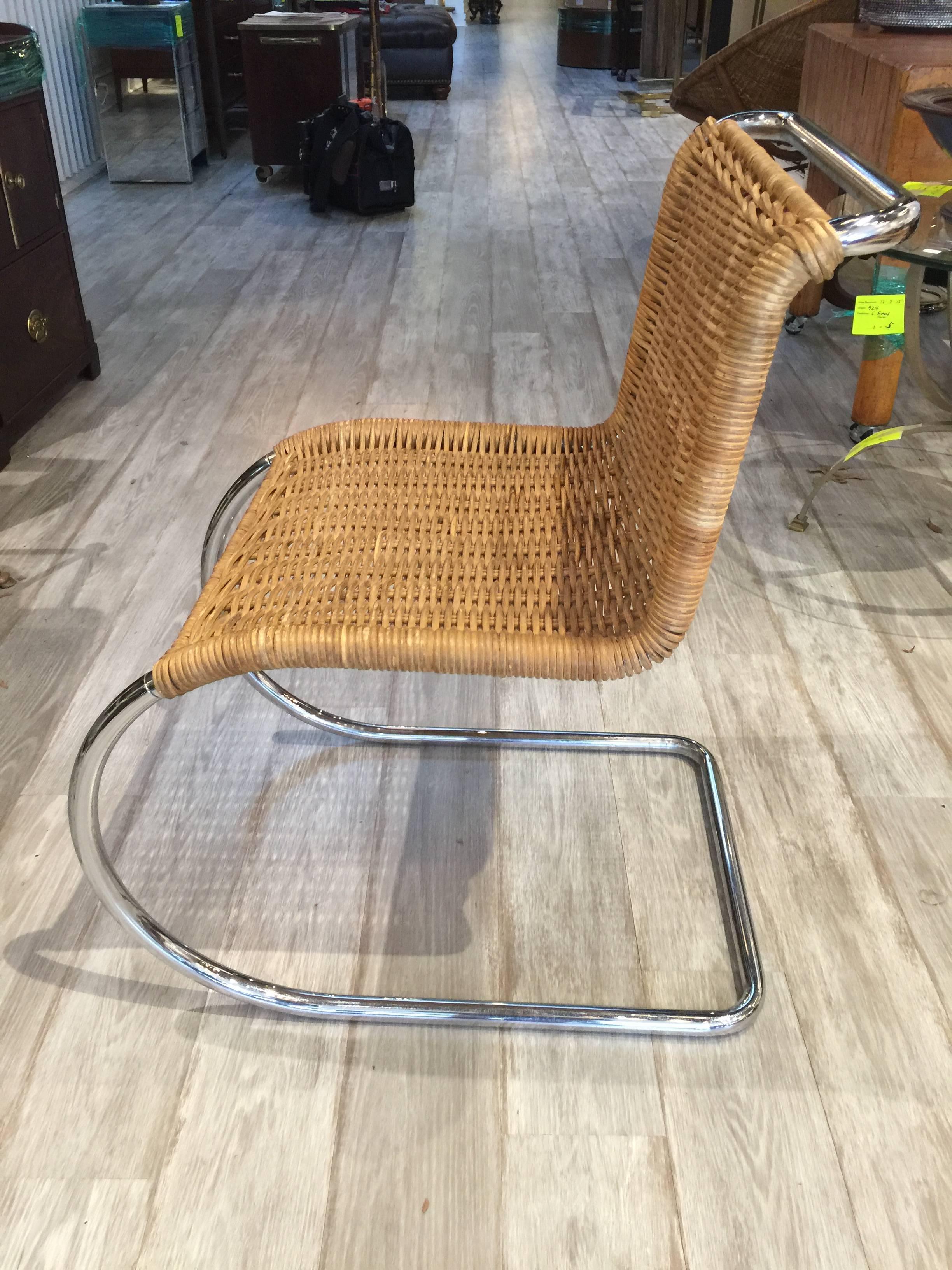 Three MR20 Style Rattan & Chrome Side Chairs
Each one with sturdy woven rattan continuous backrest and seat 