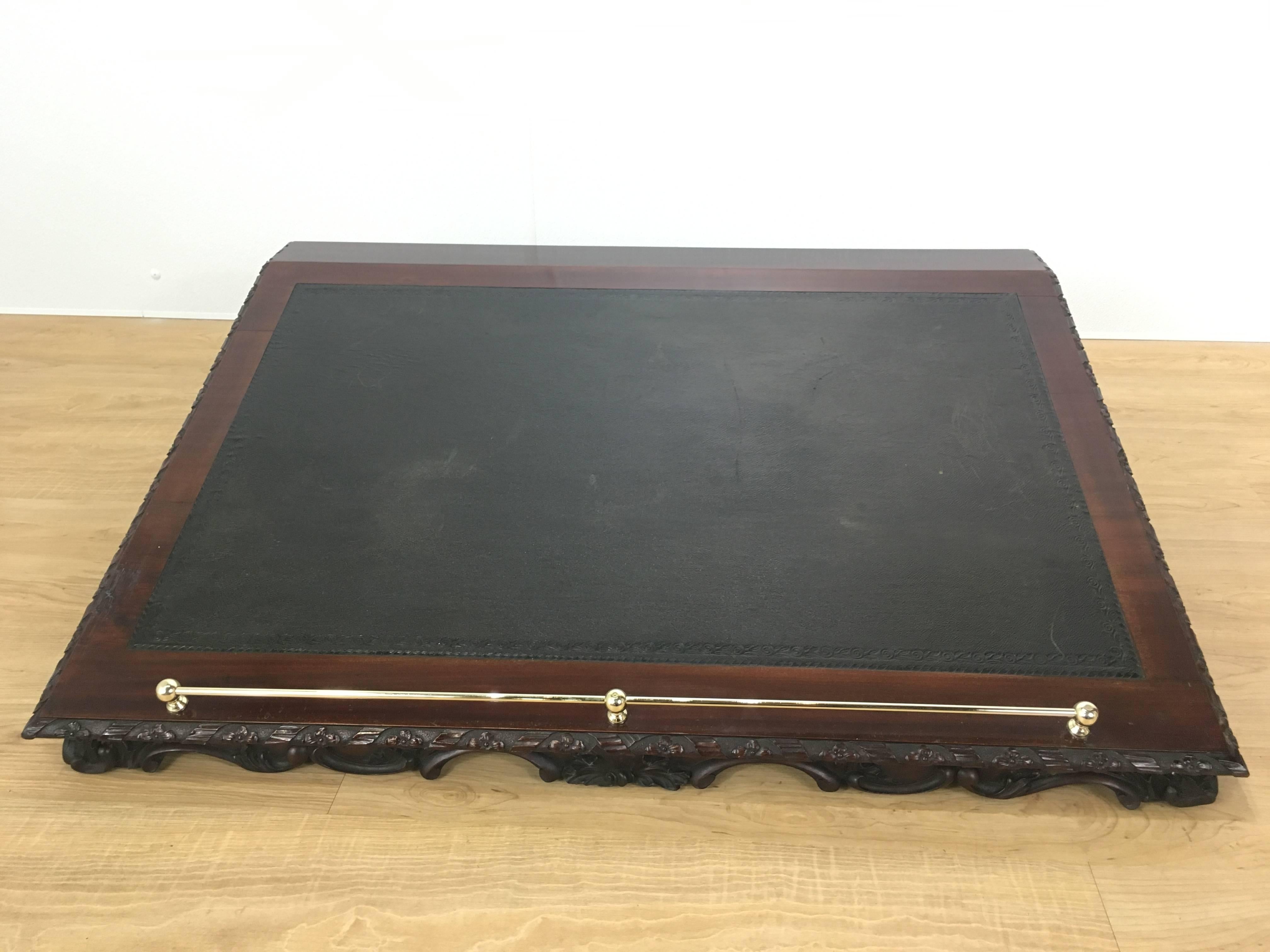 Georgian architects drafting platform, with finely carved scroll motif mahogany frame, the ample working surface on approximate 25 degree stationery angle, with inset tooled leather top and lower brass gallery rail.
