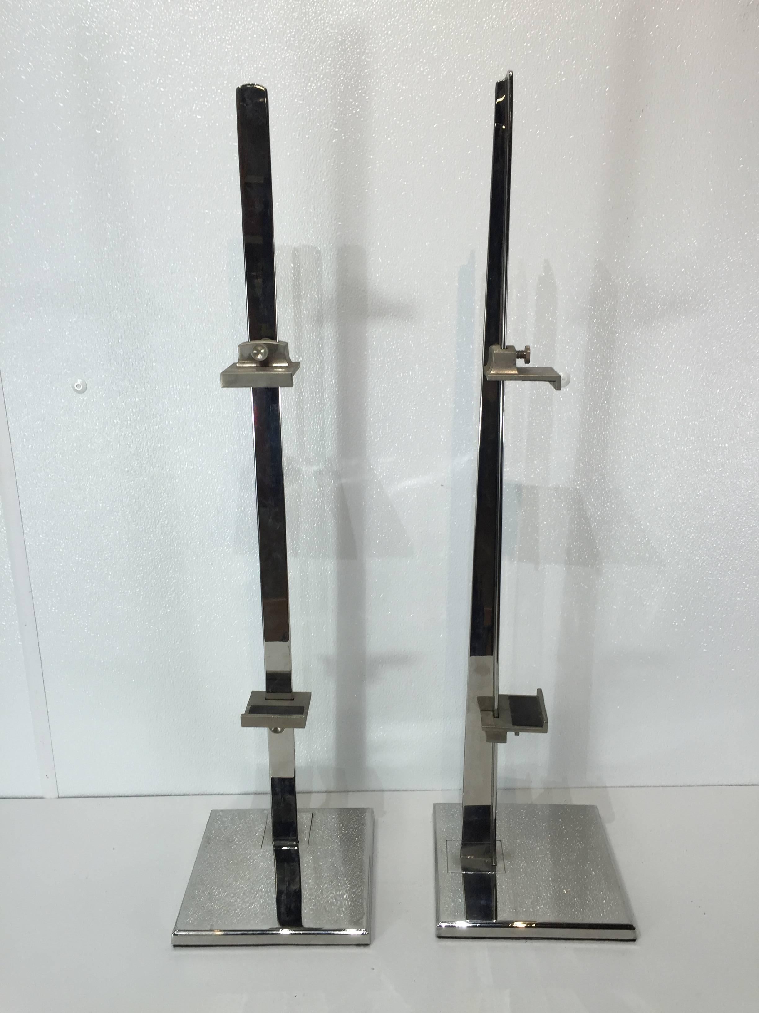 Pair of 1970s chrome museum easels.
Each one of typical form with polished chrome with 2.5