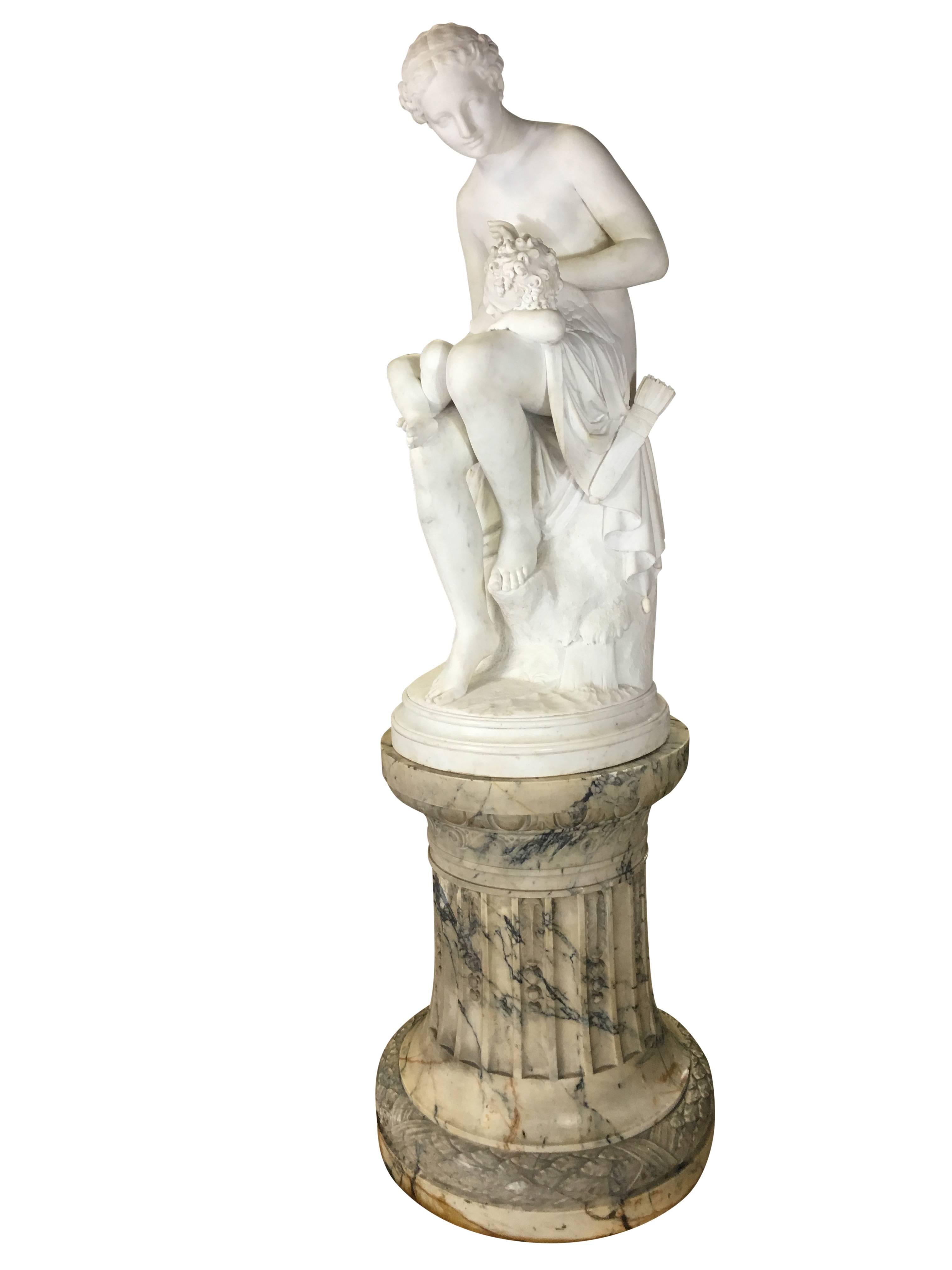 Guillaume Geefs (1805-1883)
Venus Clipping Cupids Wings
Royal Sculptor of Belgium, 1832
Palace size marble sculpture of a seated draped Venus on the stump of oak tree, with scissors in her right hand and cupid resting on her lap.
Complete with the