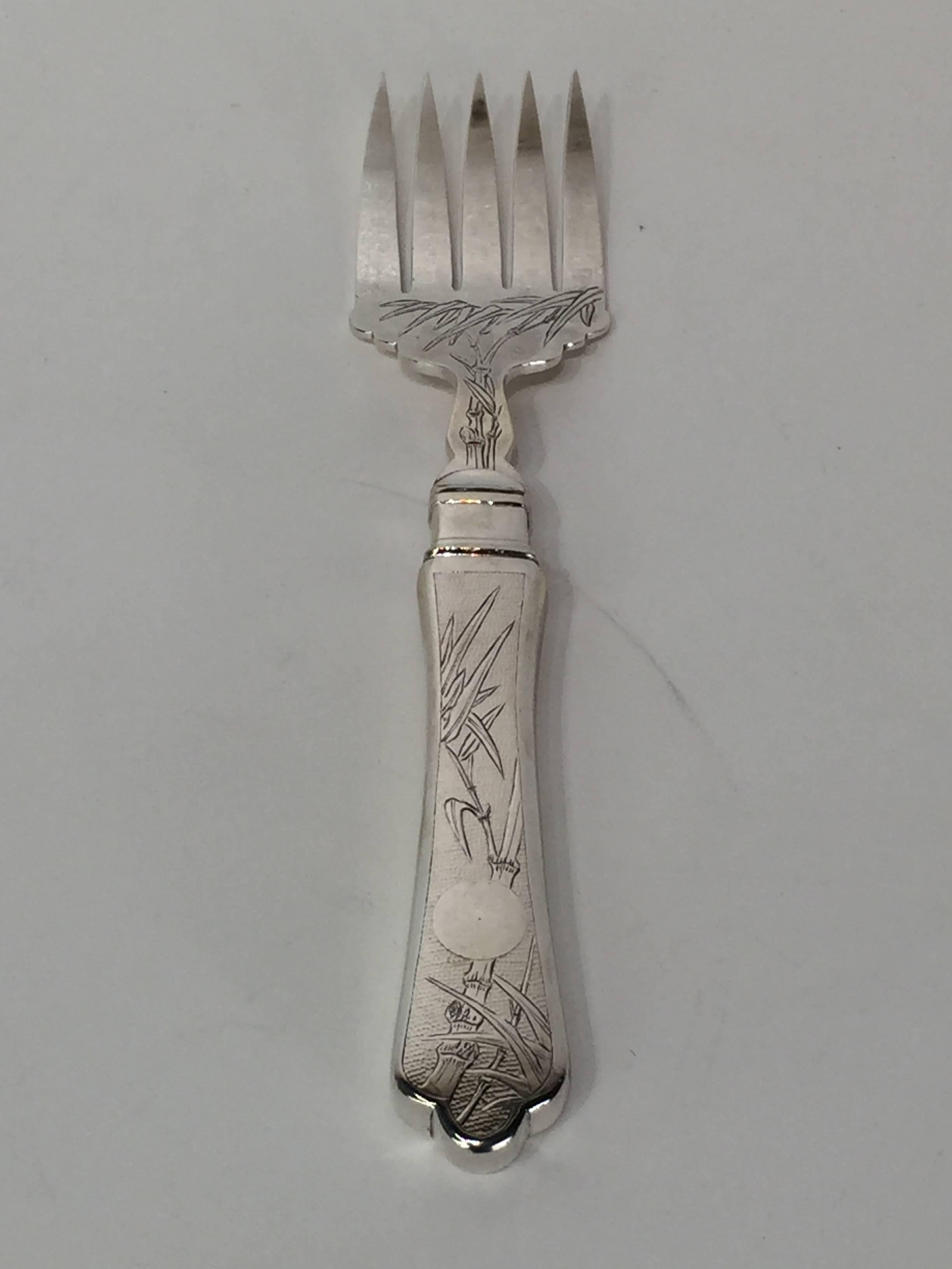 Heavy Chinese export silver salad set, each one engraved with bamboo and moon motif, Hallmarked Siu Kee, Hong Kong, solid sterling total weight of 12.3 troy ounces.
Knife measures 12.5" W x 2.25" H x 5" D.
Fork measures 10" LW x